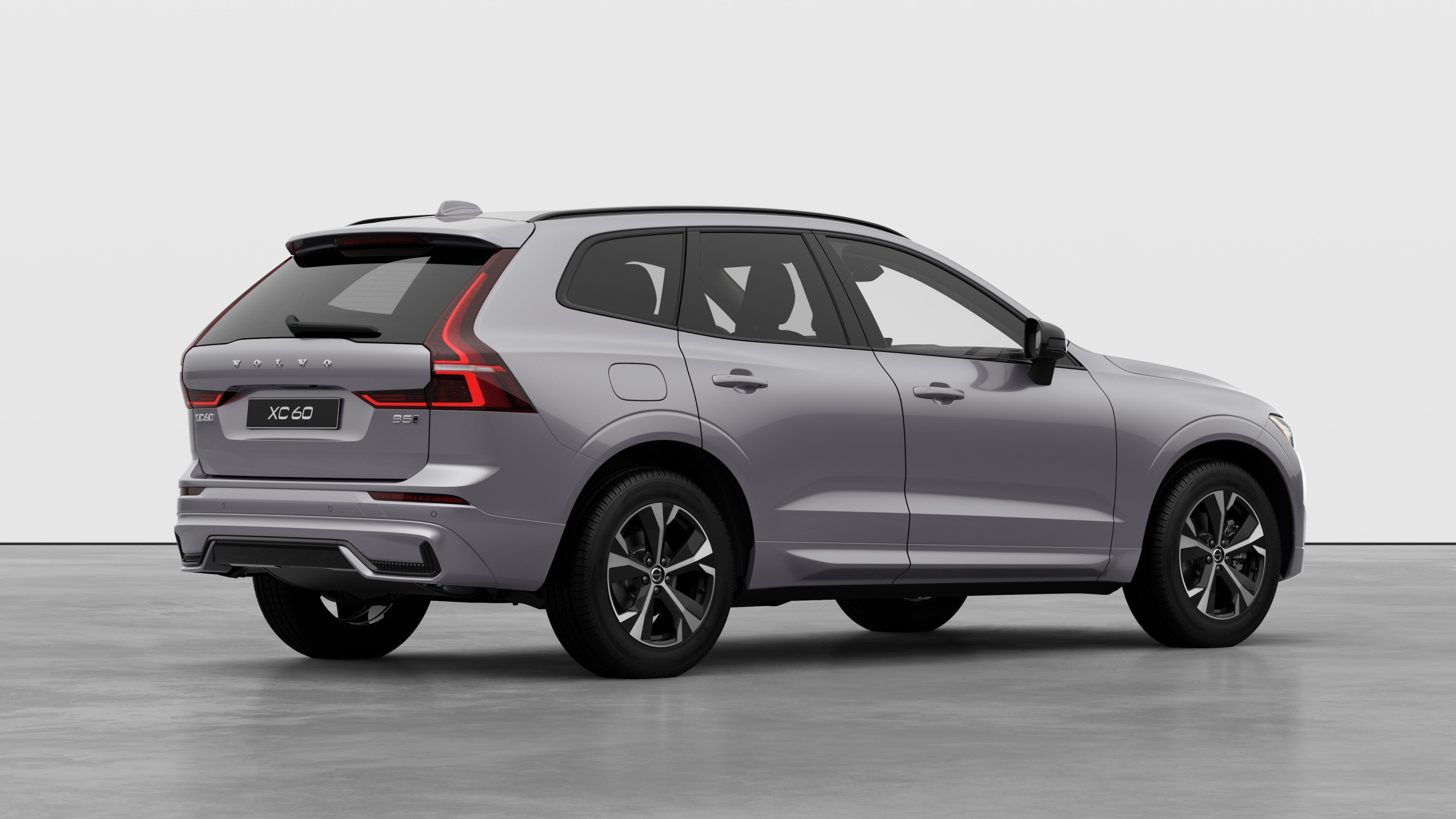 Volvo car rear three-quarter view on plain studio background.