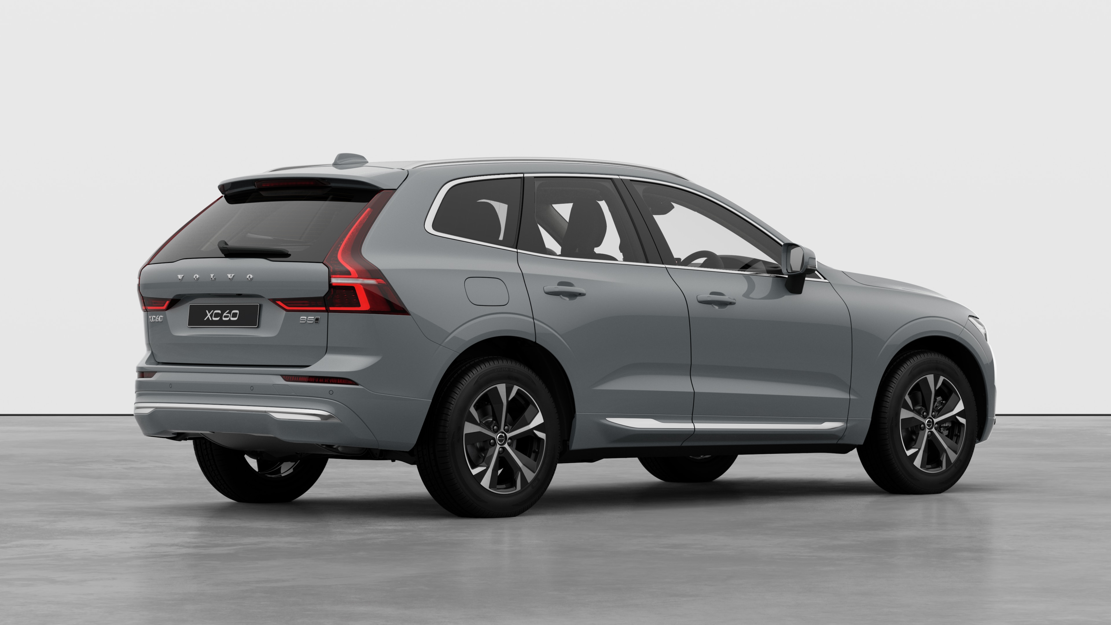 Volvo car rear three-quarter view on plain studio background.