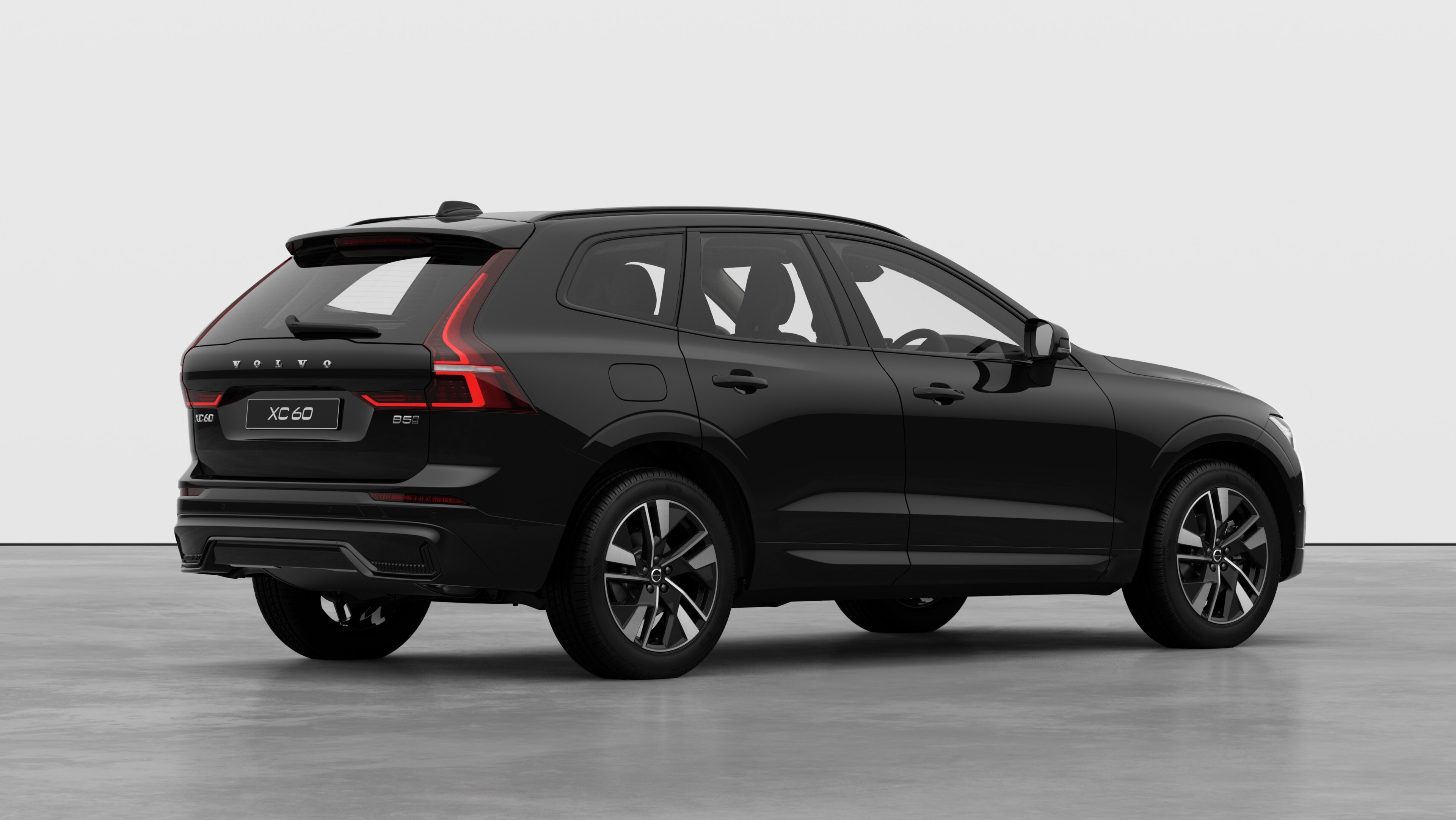 Volvo car rear three-quarter view on plain studio background.