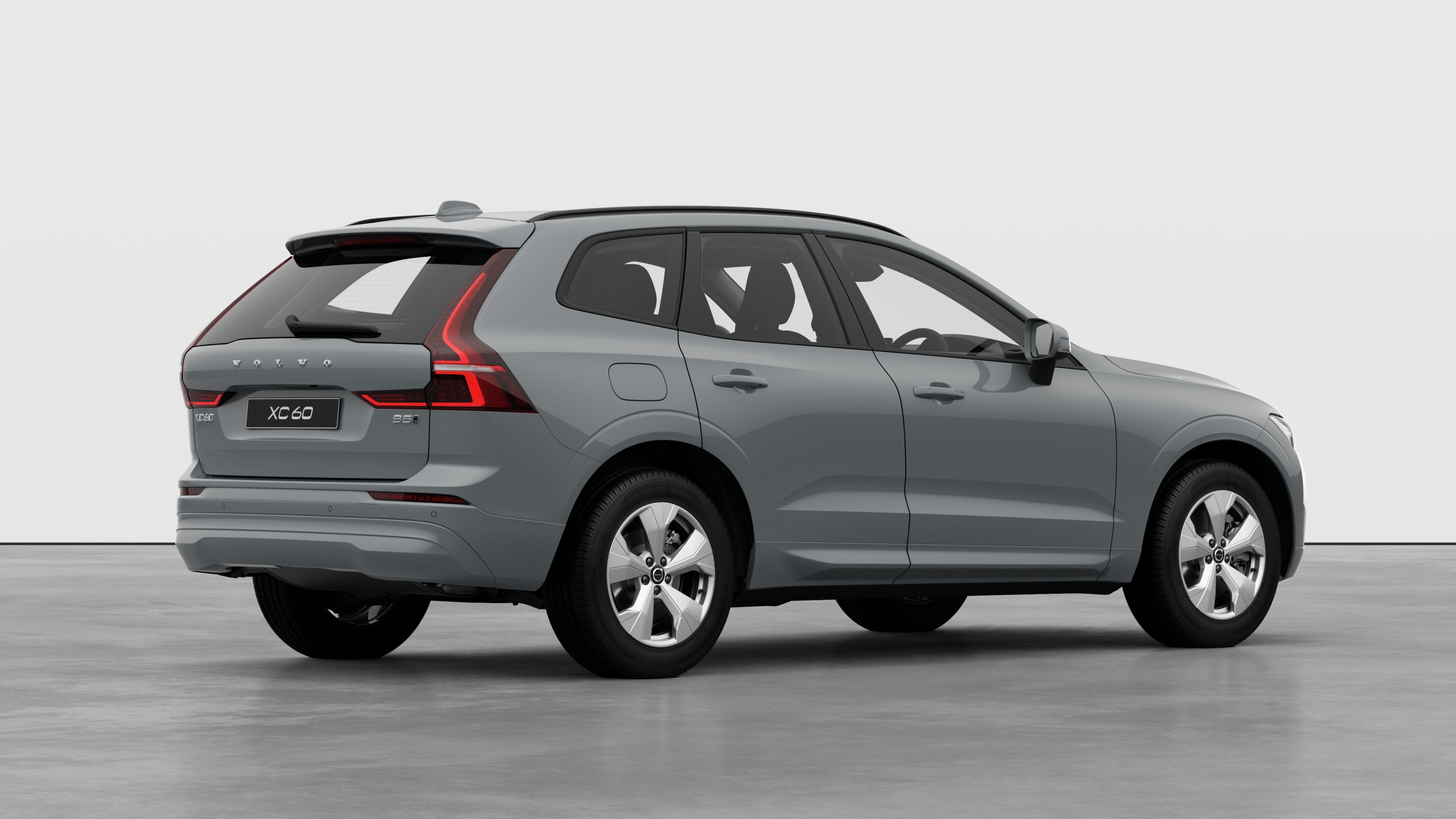 Volvo car rear three-quarter view on plain studio background.