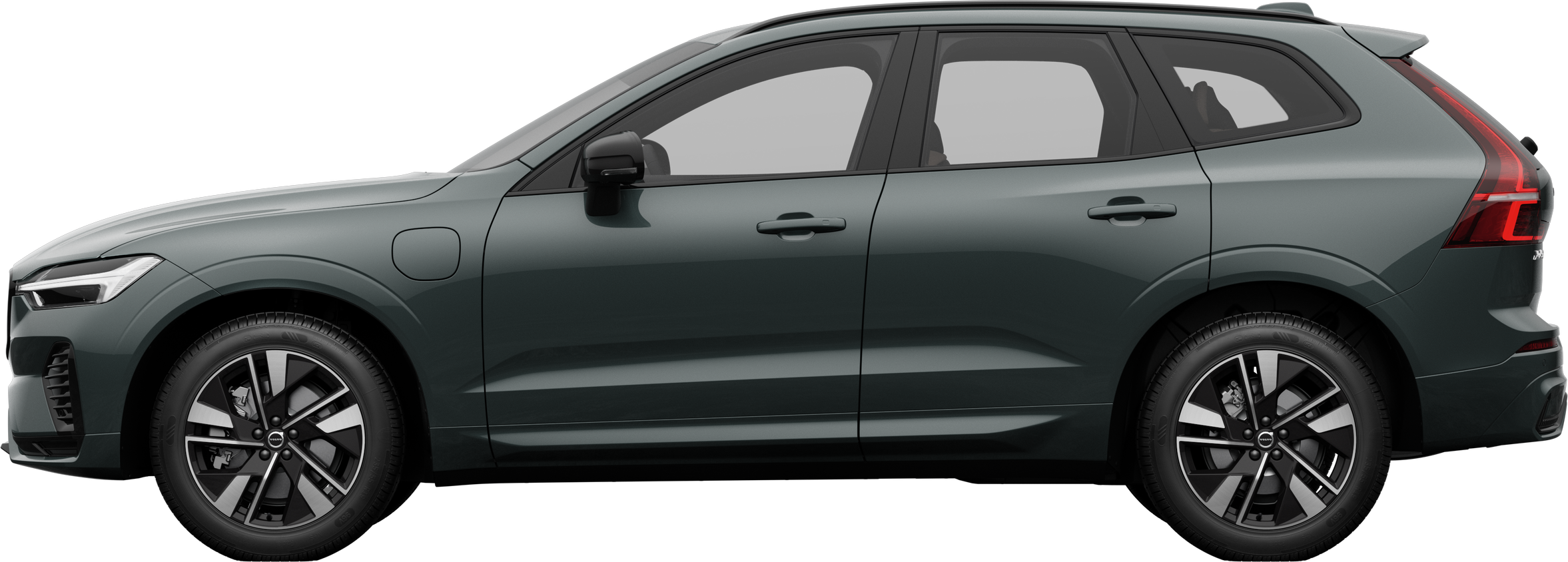 Vista lateral de un vehículo Volvo estacionado sobre un fondo de estudio liso, que muestra el elegante perfil y el diseño general del vehículo.