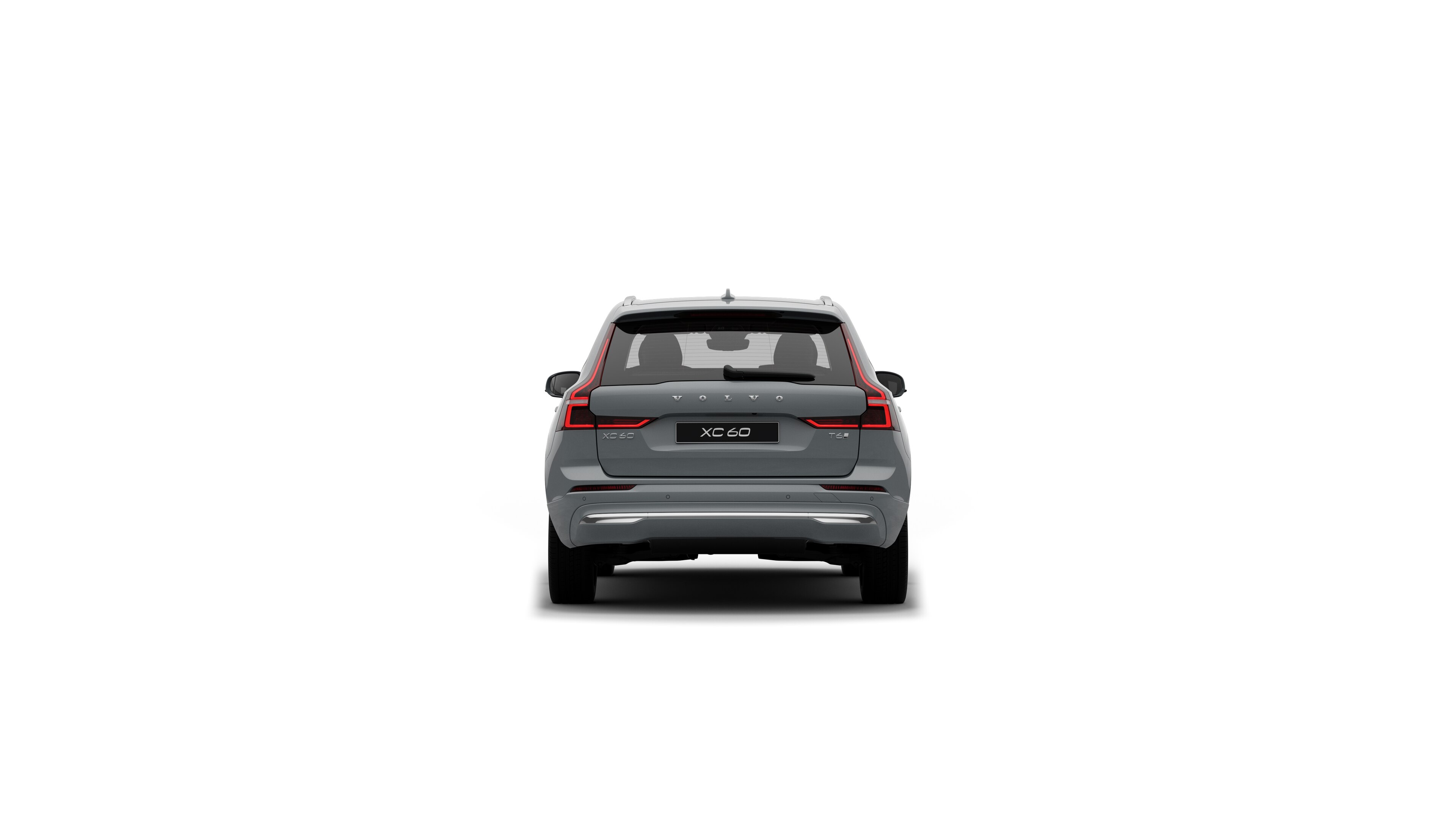 Автомобиль Volvo, вид сзади на однотонном фоне студии.