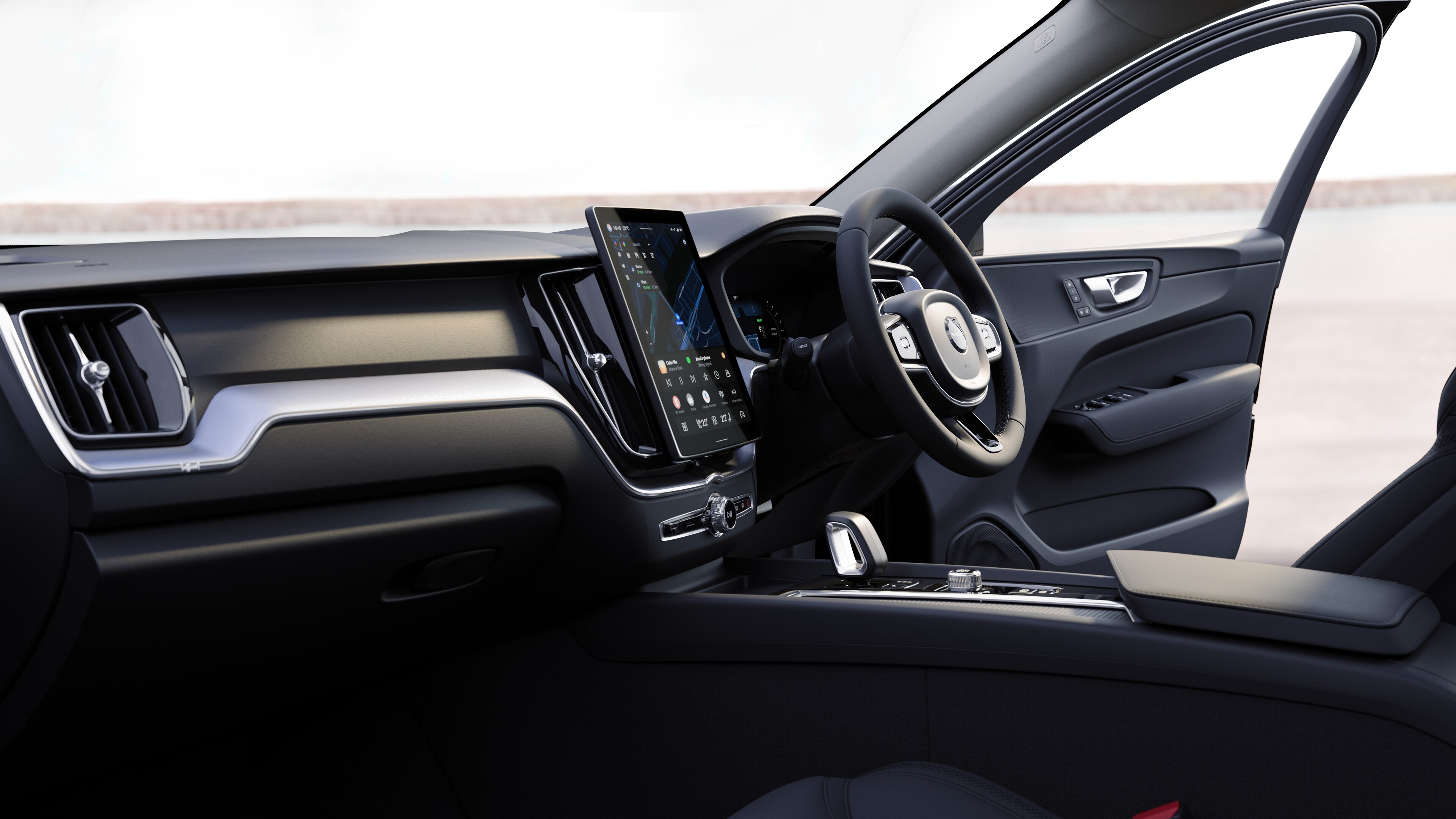 Volvo car interior showing dashboard, steering wheel, and center console with digital display in an open road background.