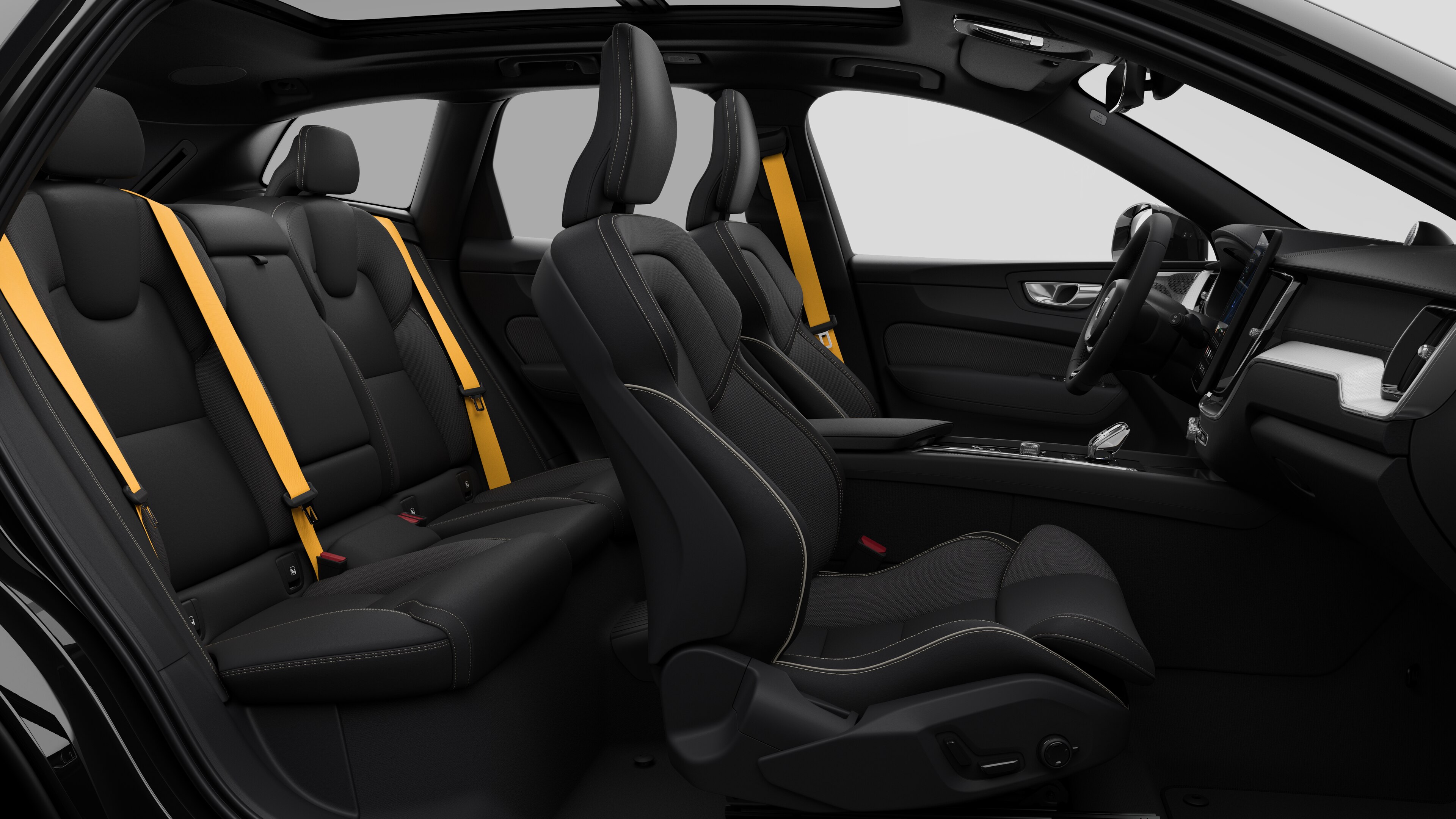Volvo car interior side view showcasing front seats, rear passenger seats, steering wheel, dashboard, and center console, set against plain studio background.