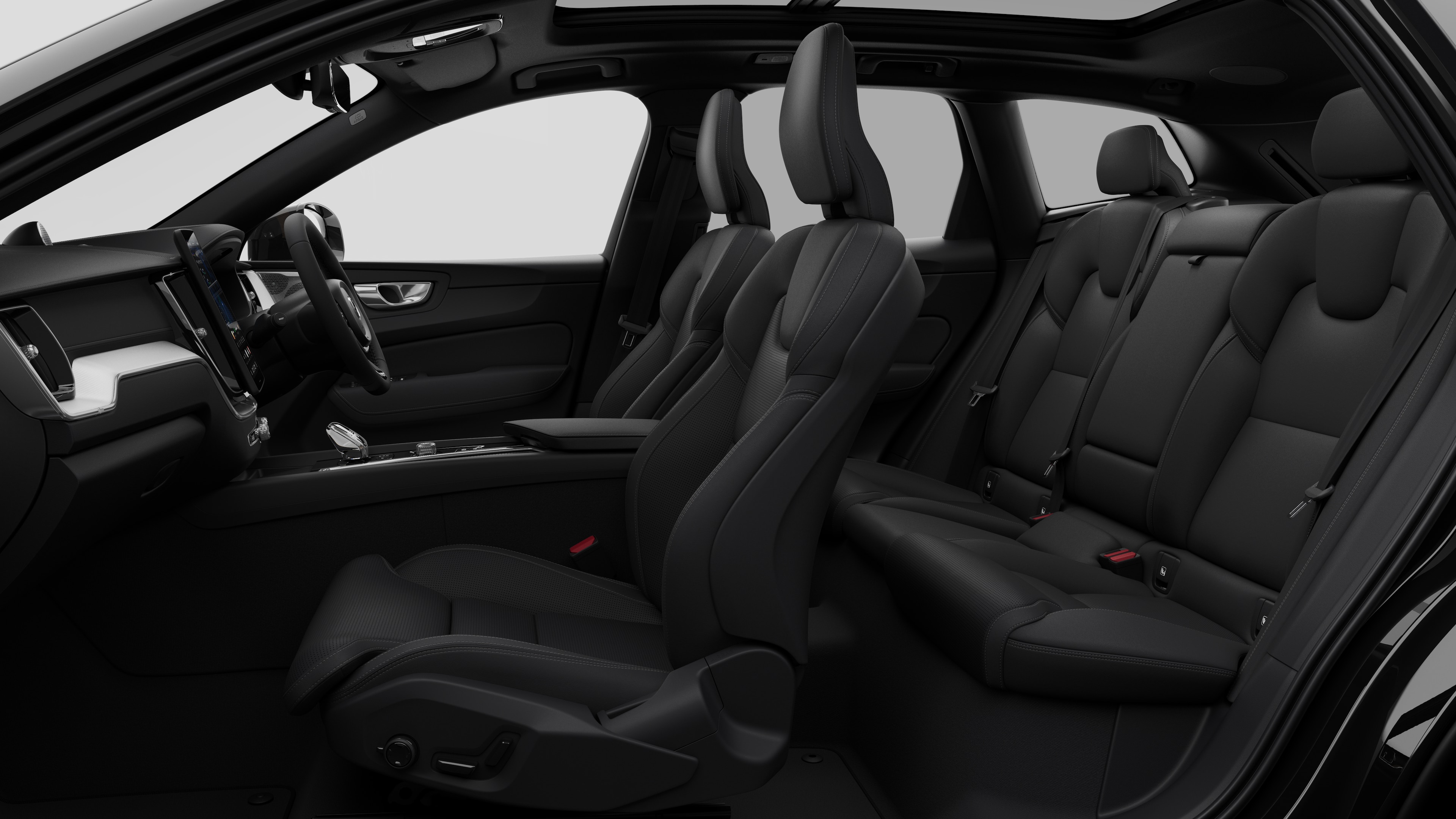 Volvo car interior side view showcasing front seats, rear passenger seats, steering wheel, dashboard, and centre console, set against plain studio background.