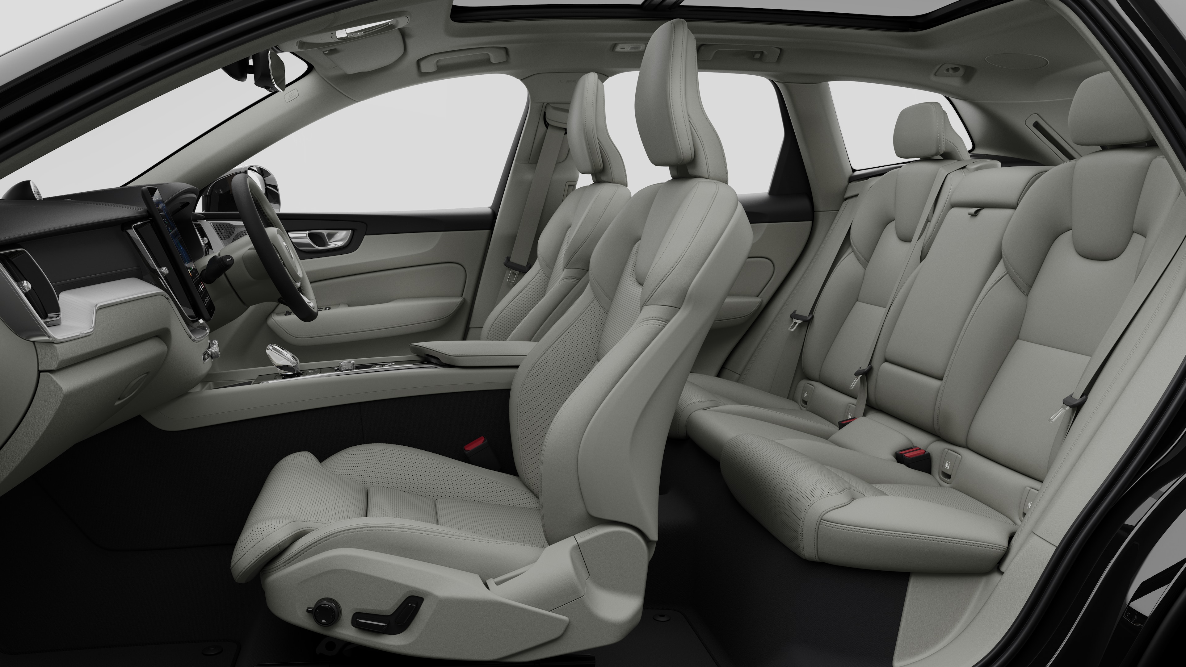 Volvo car interior side view showcasing front seats, rear passenger seats, steering wheel, dashboard, and center console, set against plain studio background.