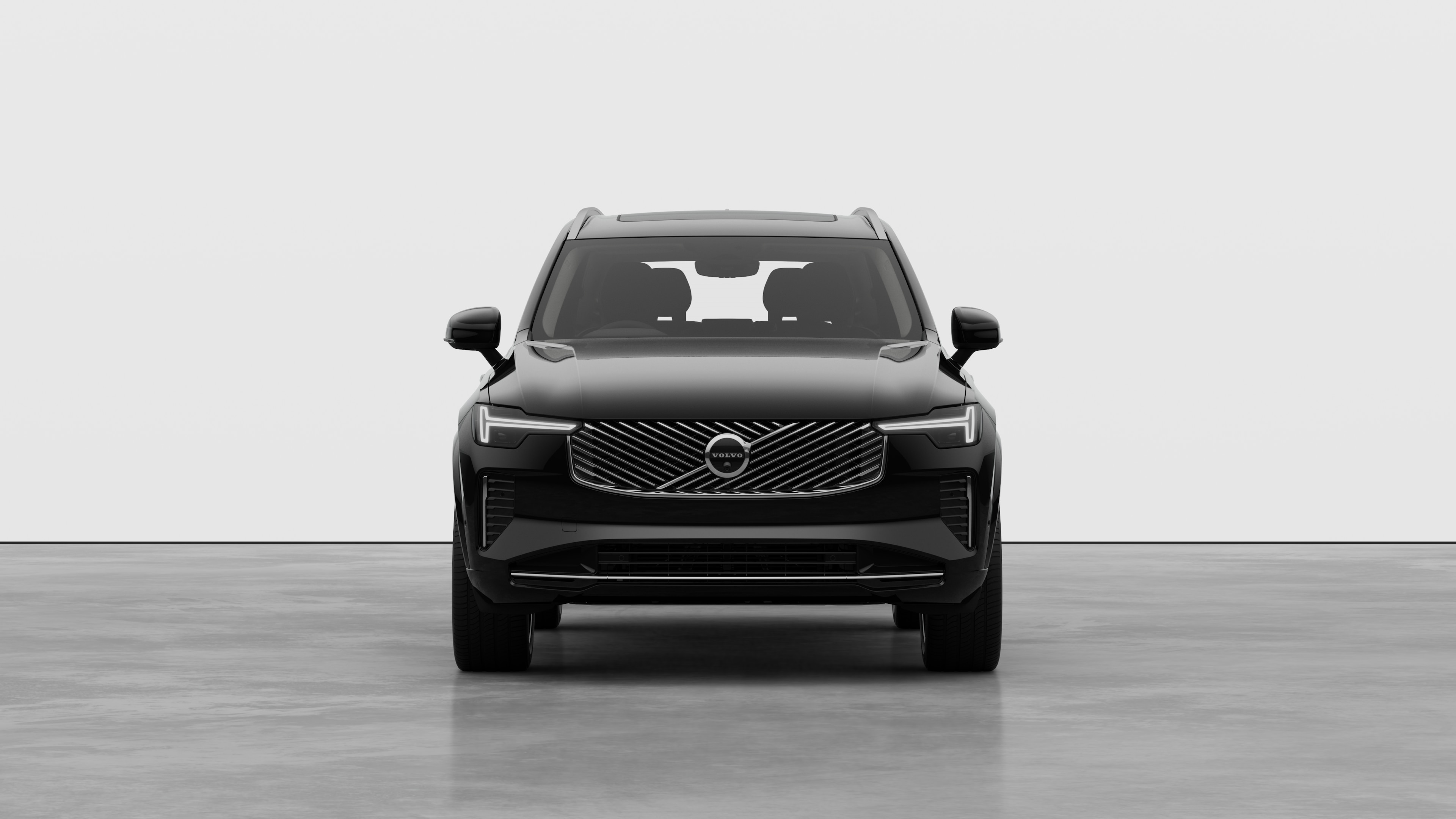 Front view of a Volvo car in a plain studio background.