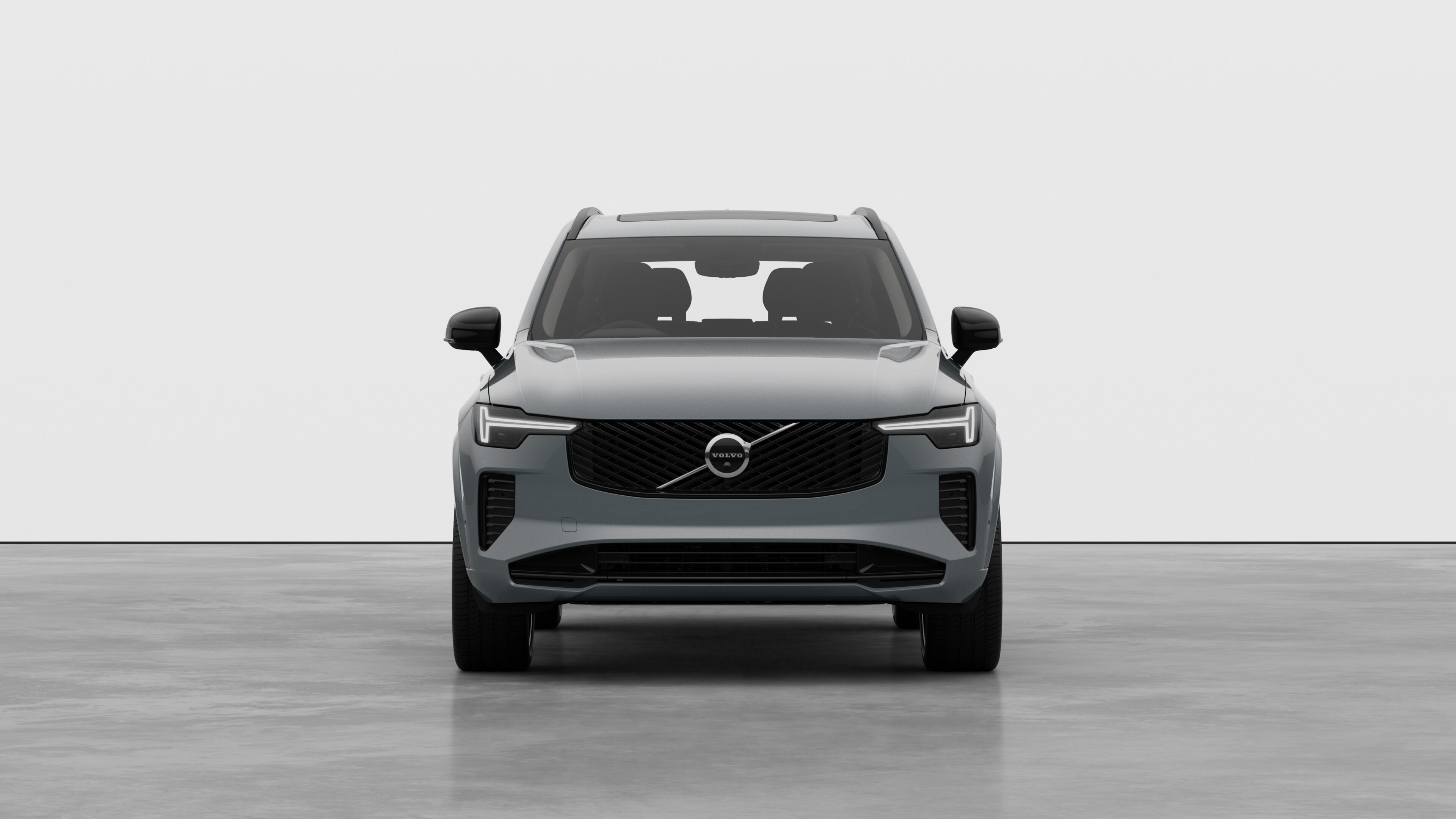Front view of a Volvo car in a plain studio background.