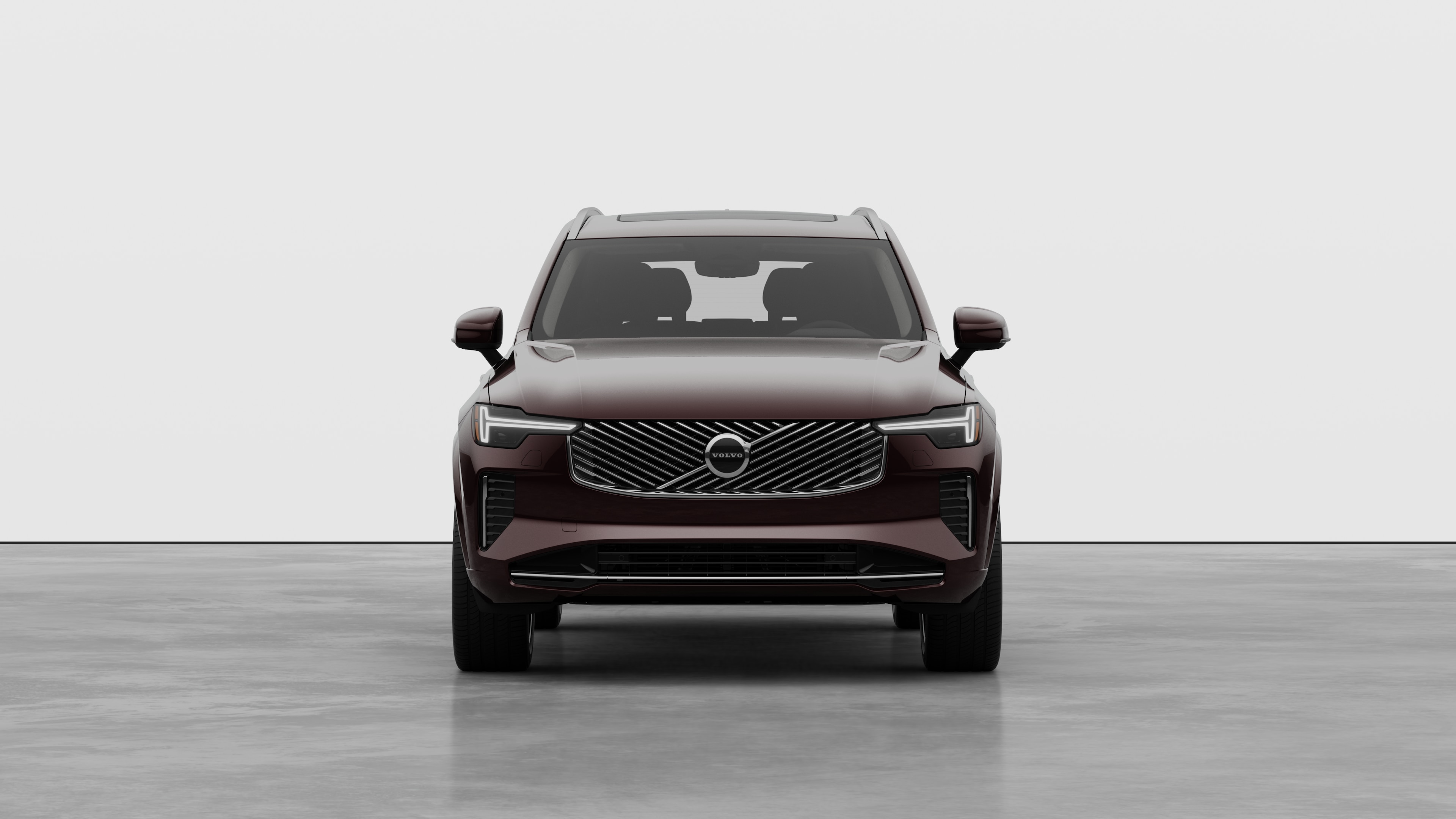 Front view of a Volvo car in a plain studio background.