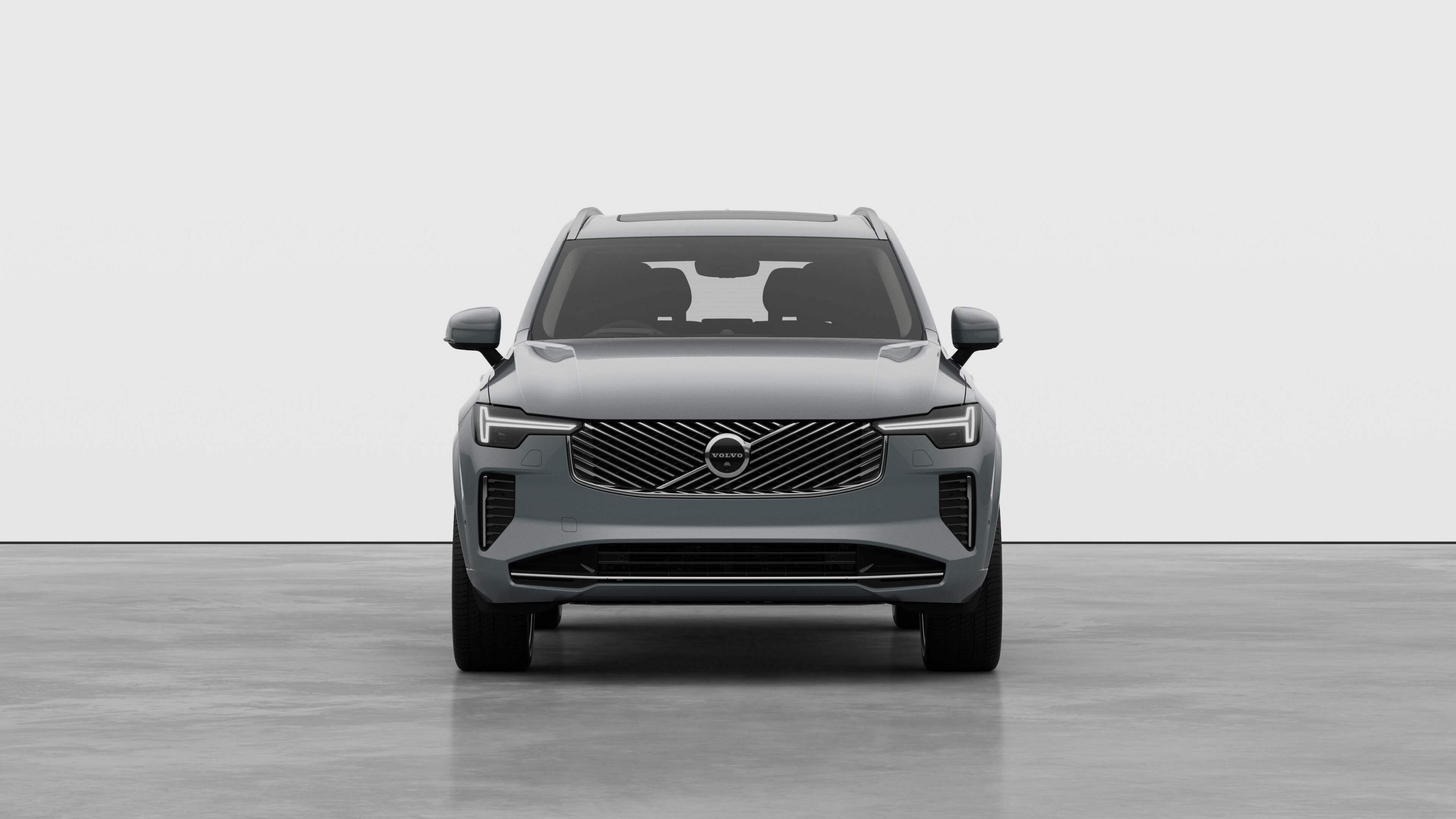 Front view of a Volvo car in a plain studio background.