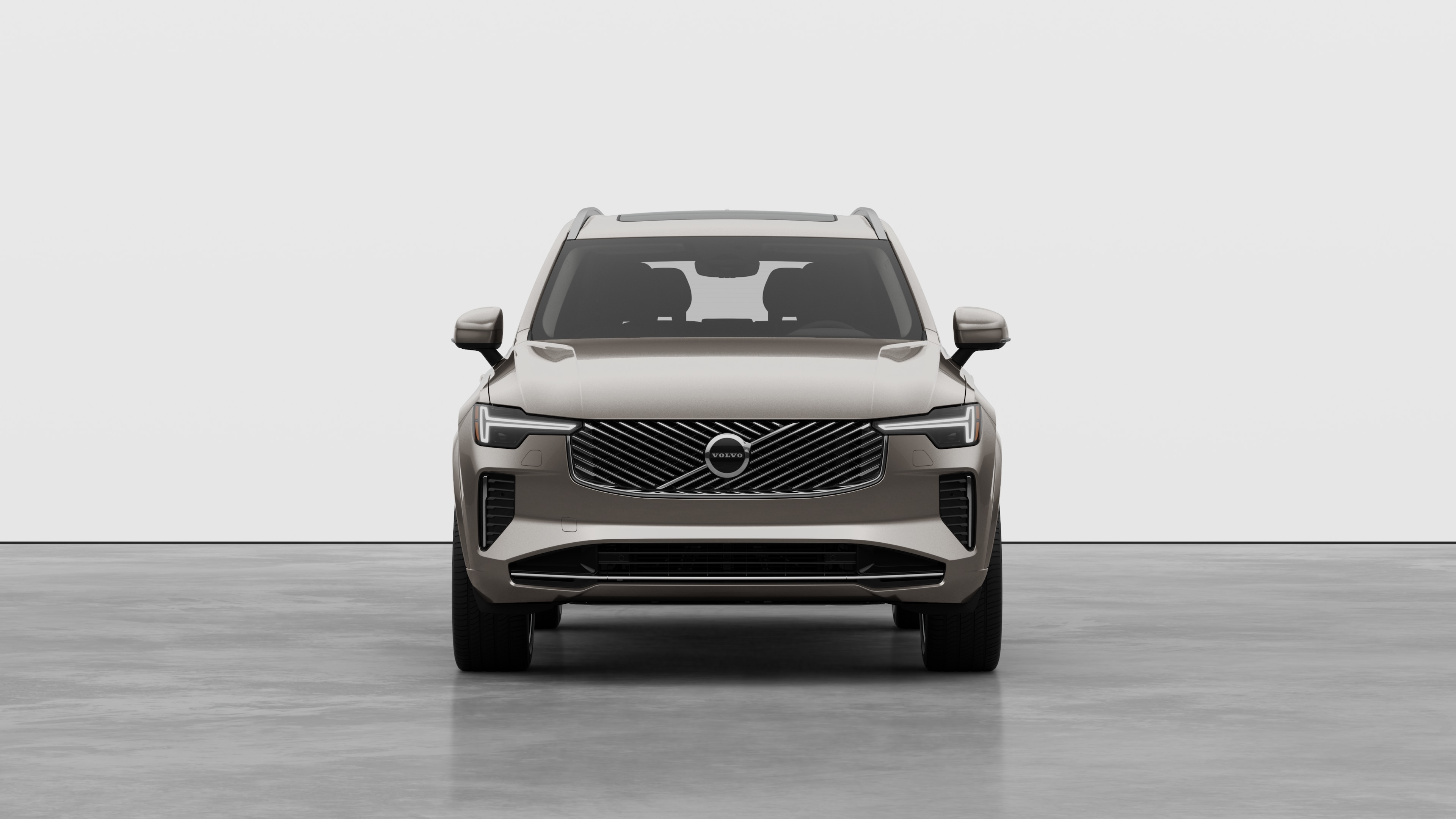 Front view of a Volvo car in a plain studio background.