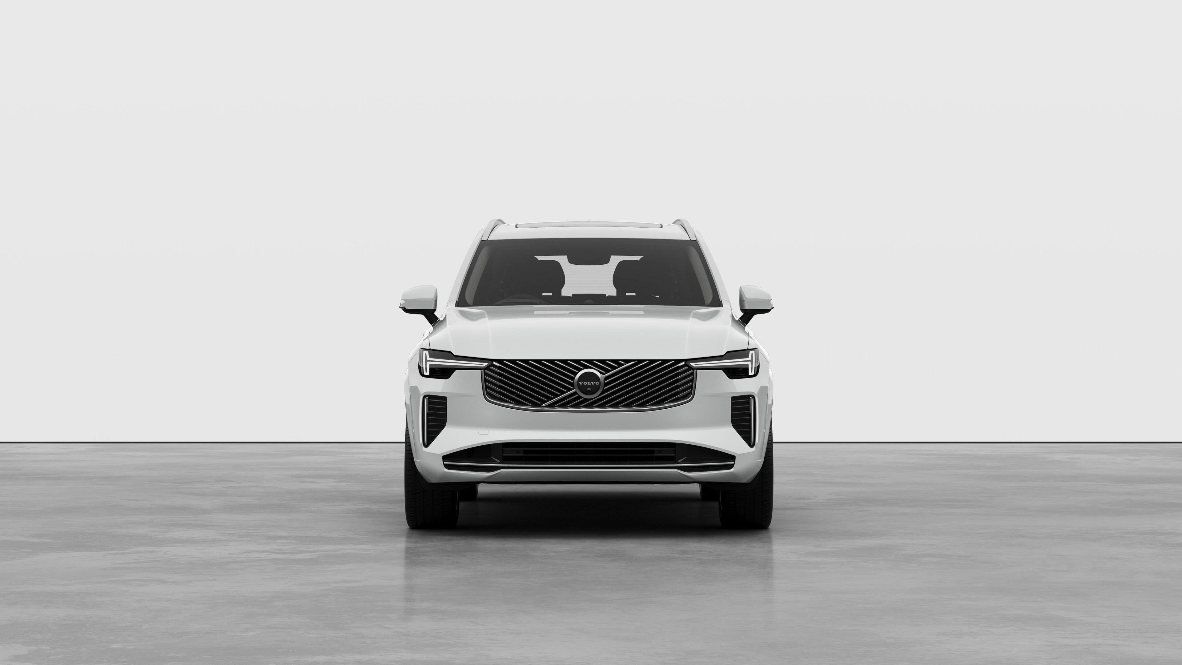 Front view of a Volvo car in a plain studio background.