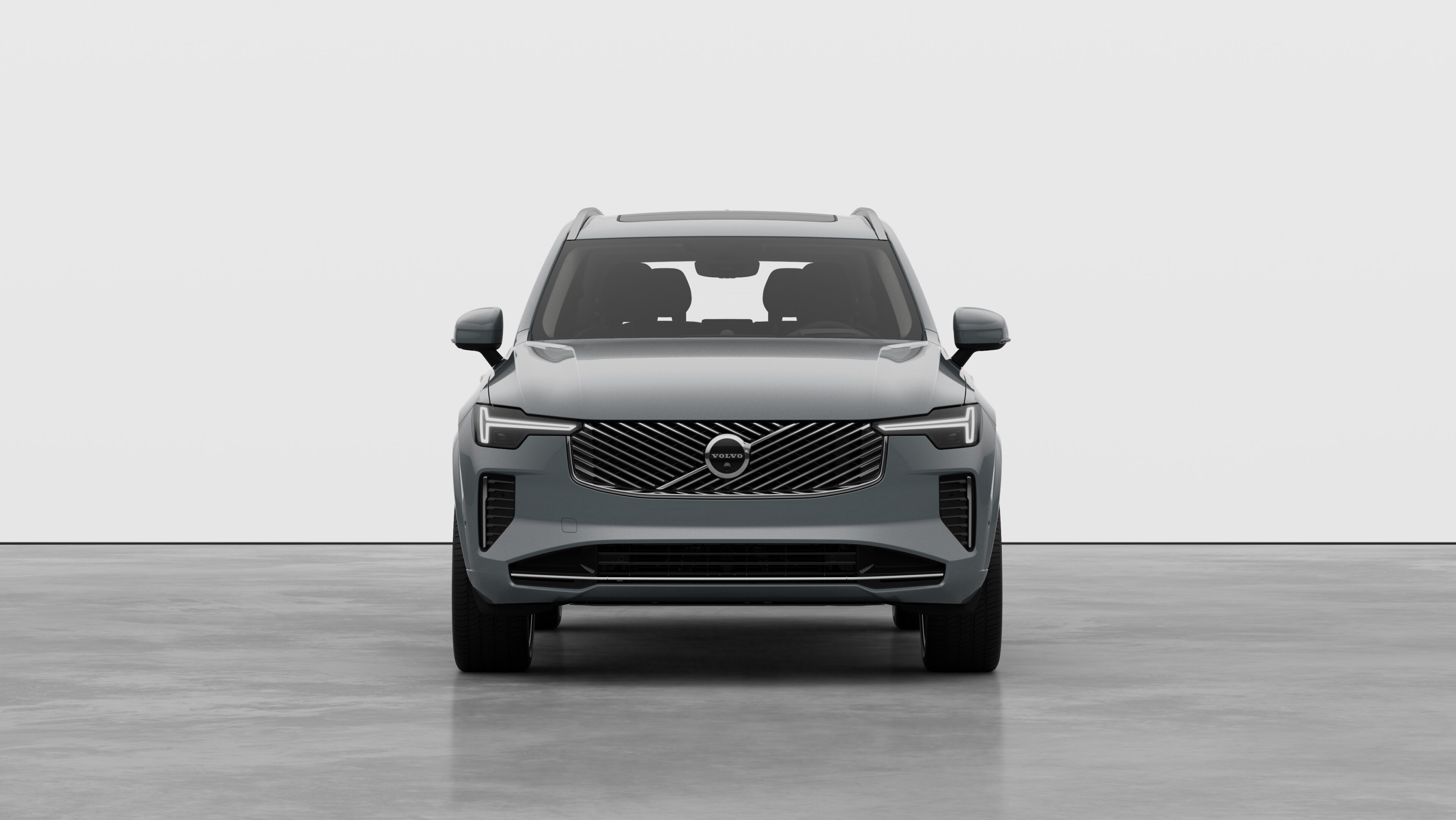 Front view of a Volvo car in a plain studio background.