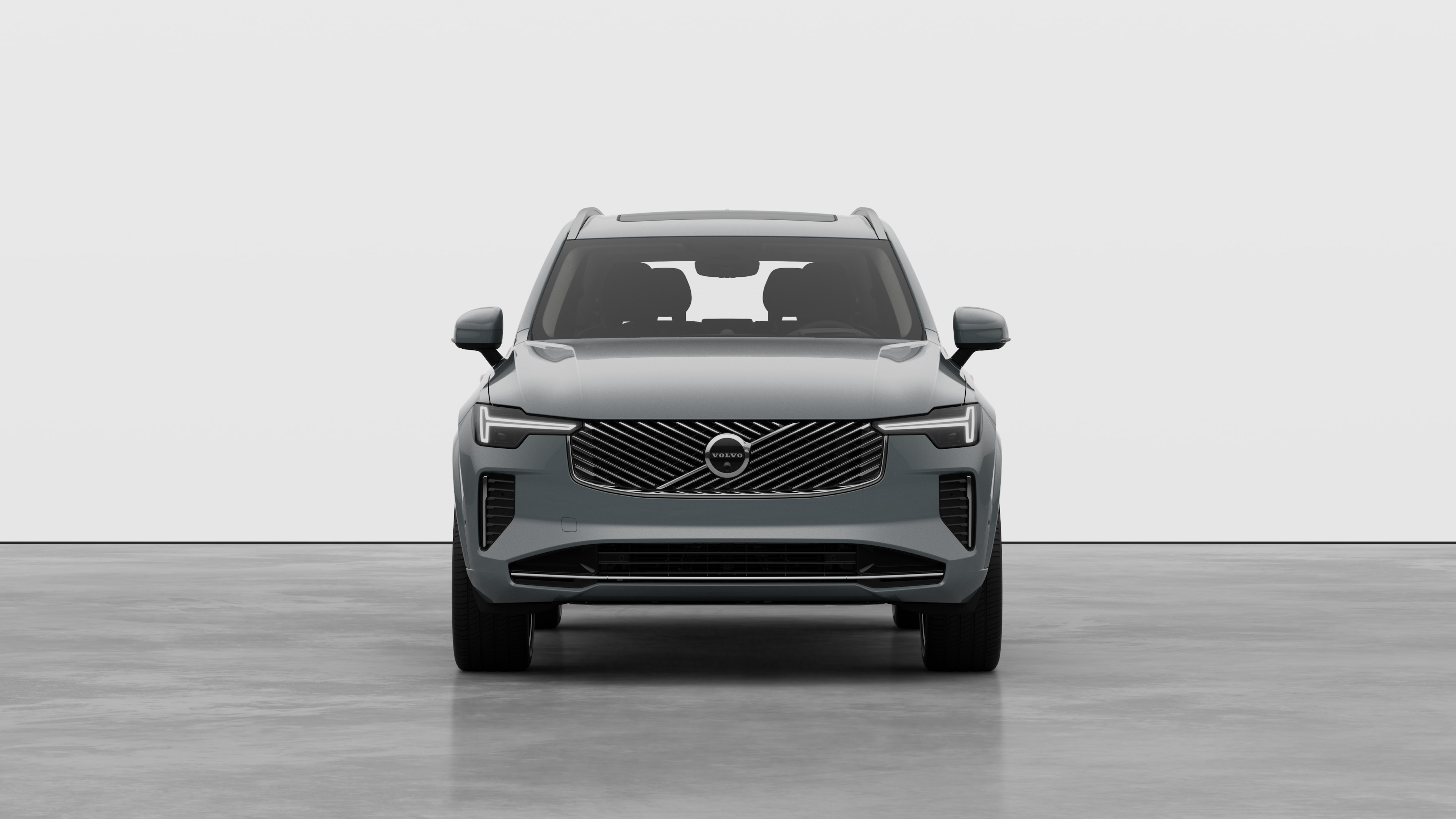 Front view of a Volvo car in a plain studio background.