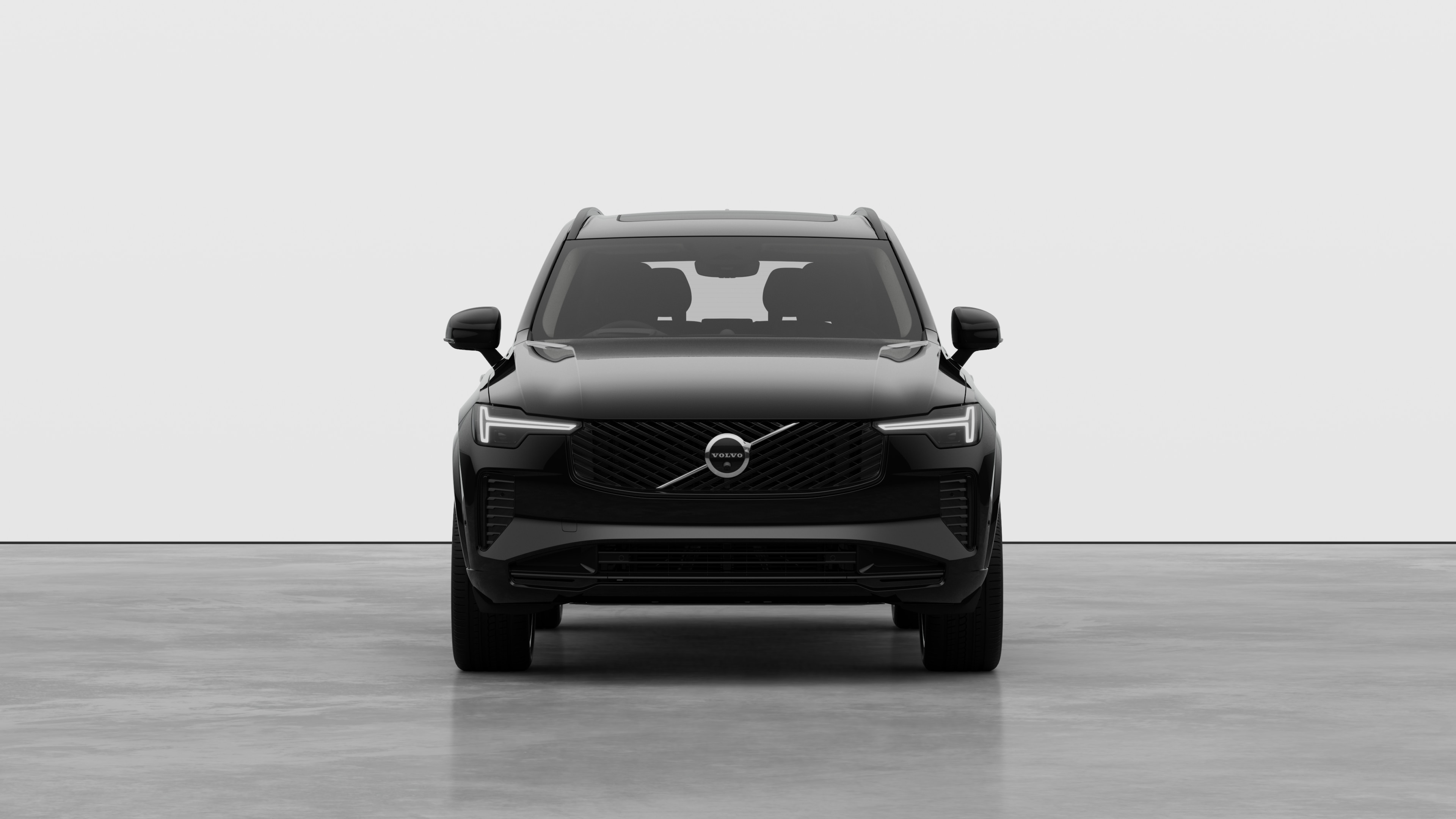 Front view of a Volvo car in a plain studio background.