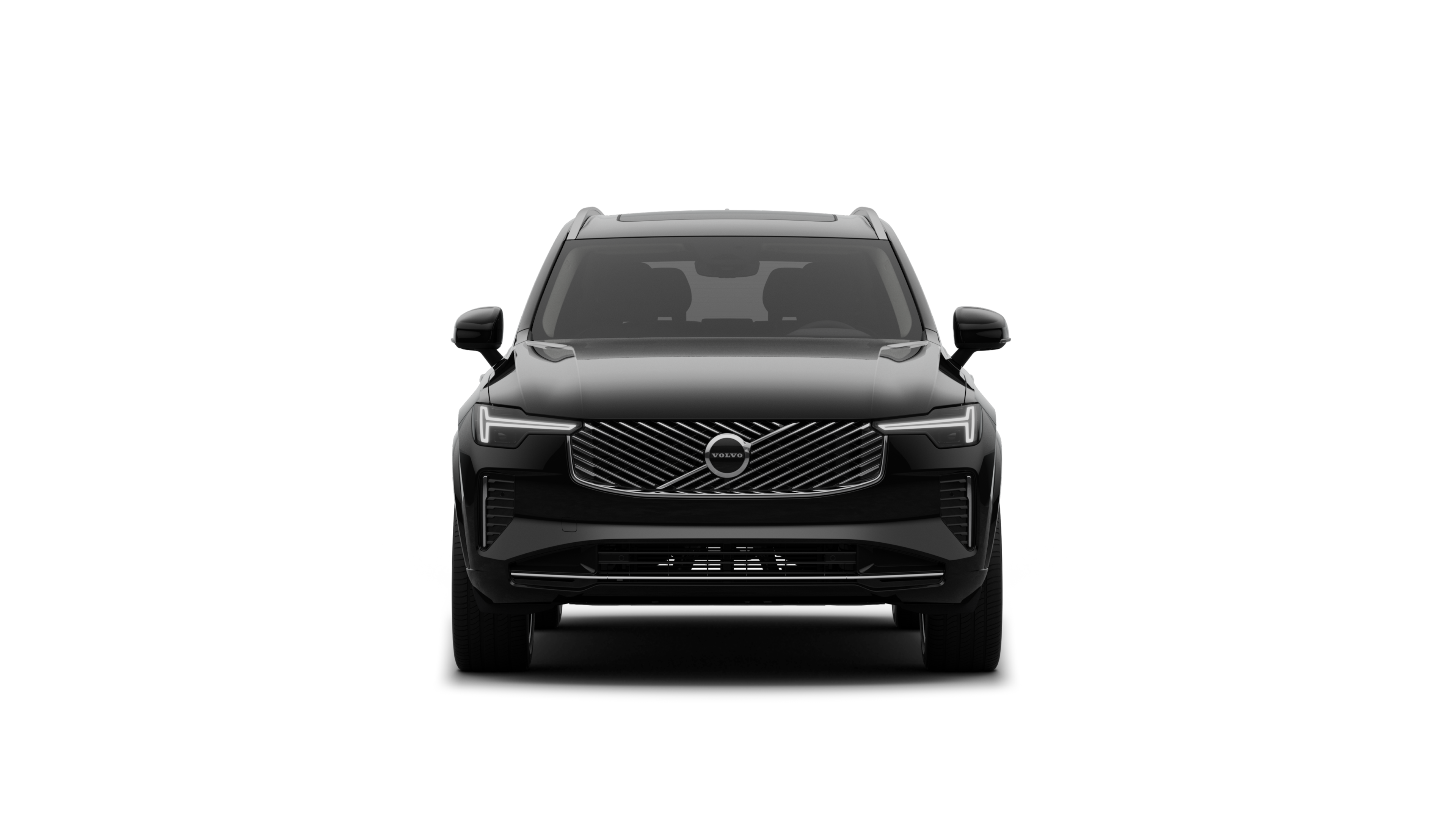 Vista frontal de un vehículo Volvo en un fondo de estudio liso.