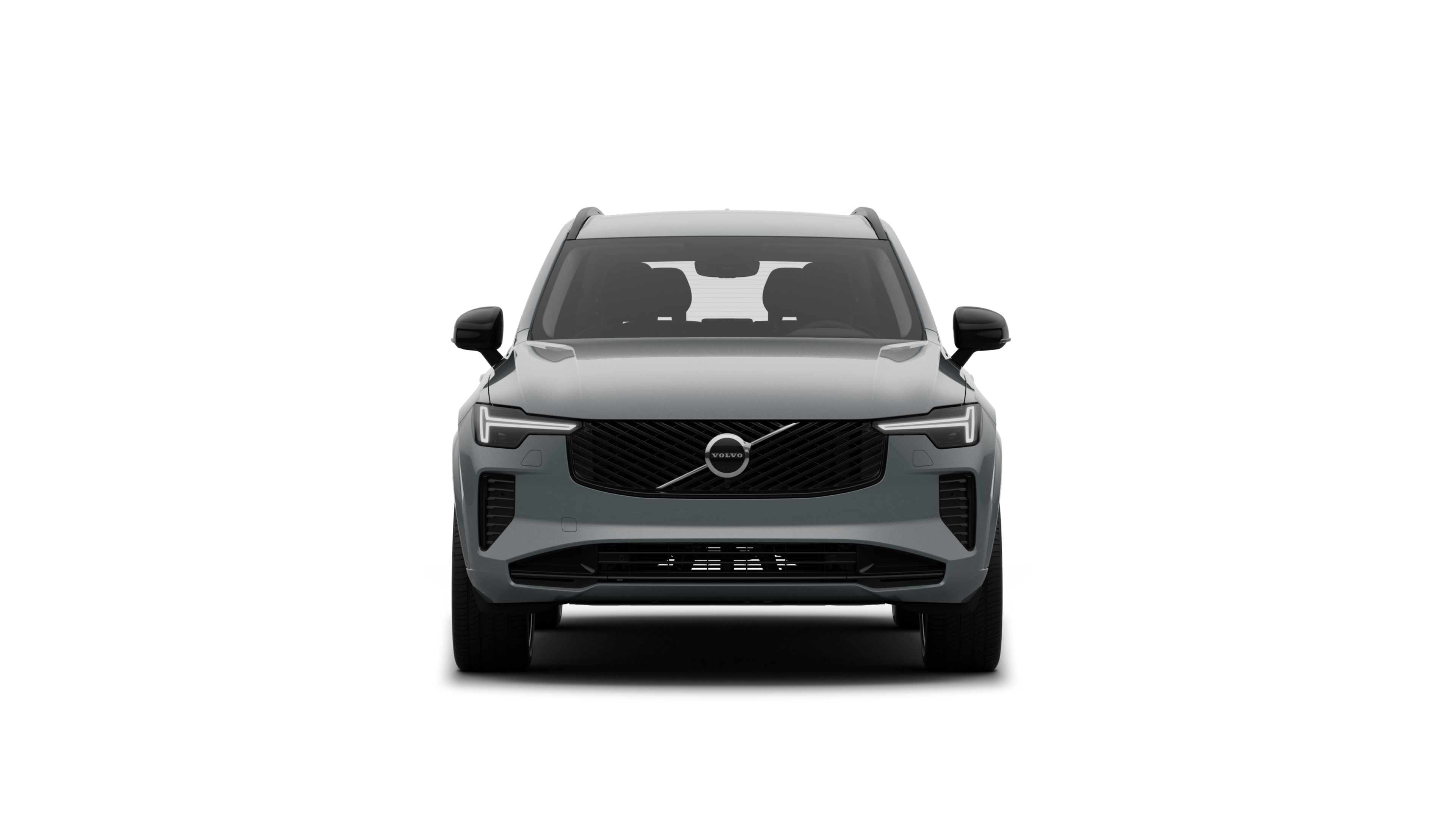 Widok samochodu Volvo z przodu na tle zwykłego studia