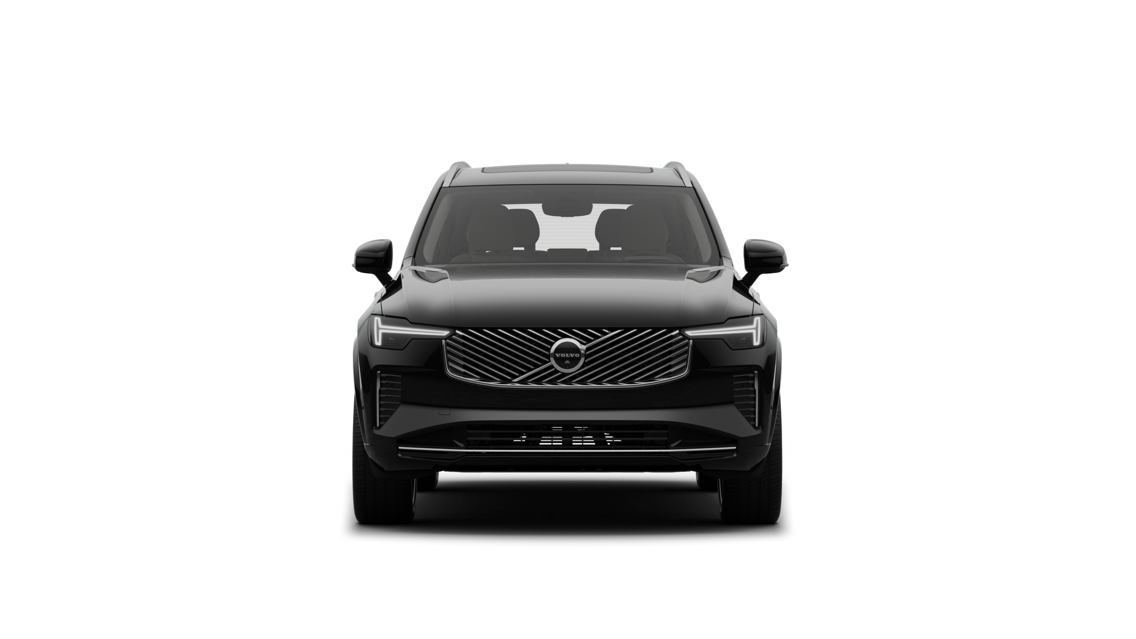 Vista frontal de un vehículo Volvo en un fondo de estudio liso.
