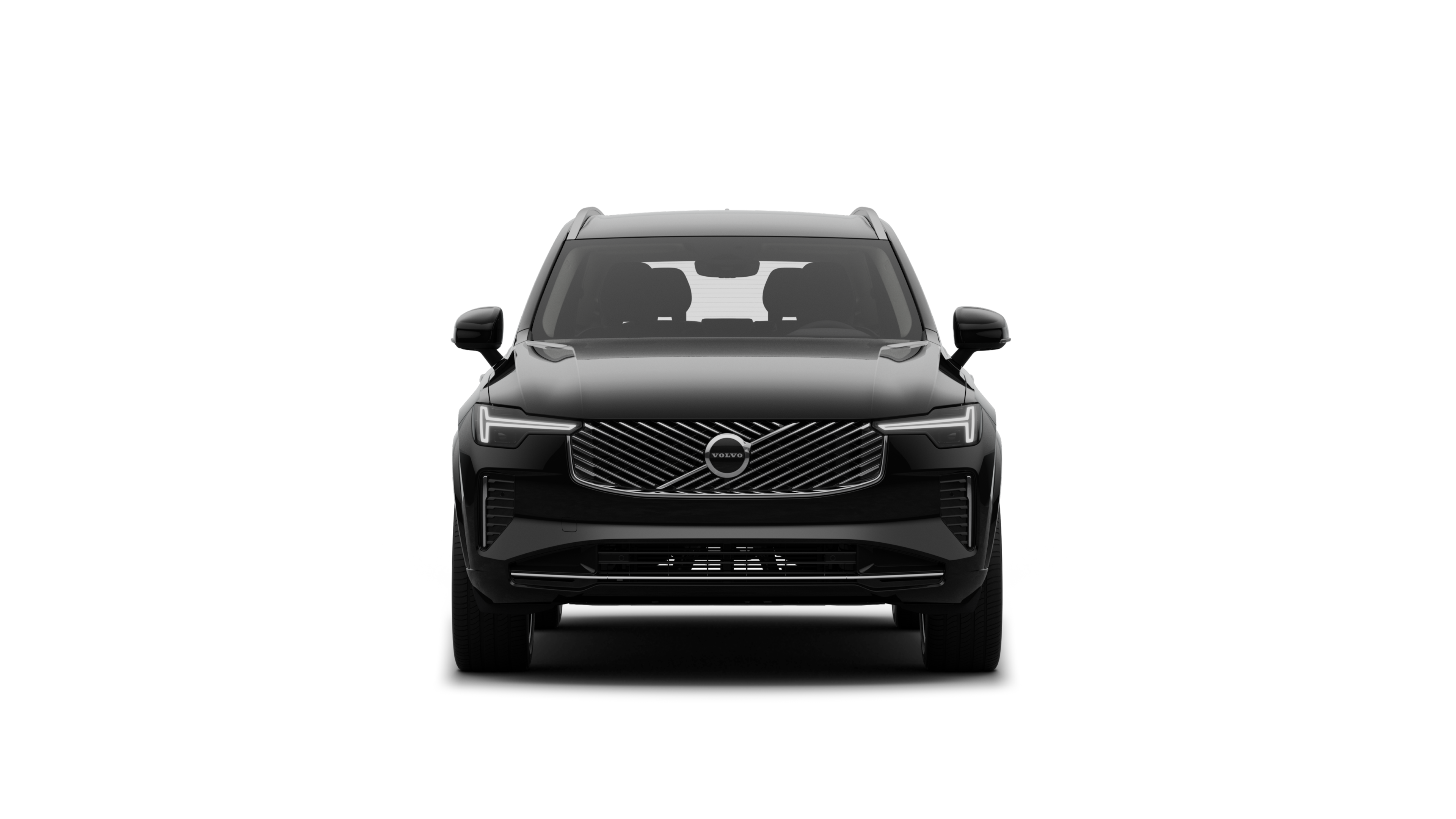Vista frontale di un'auto Volvo sullo sfondo di un semplice studio.