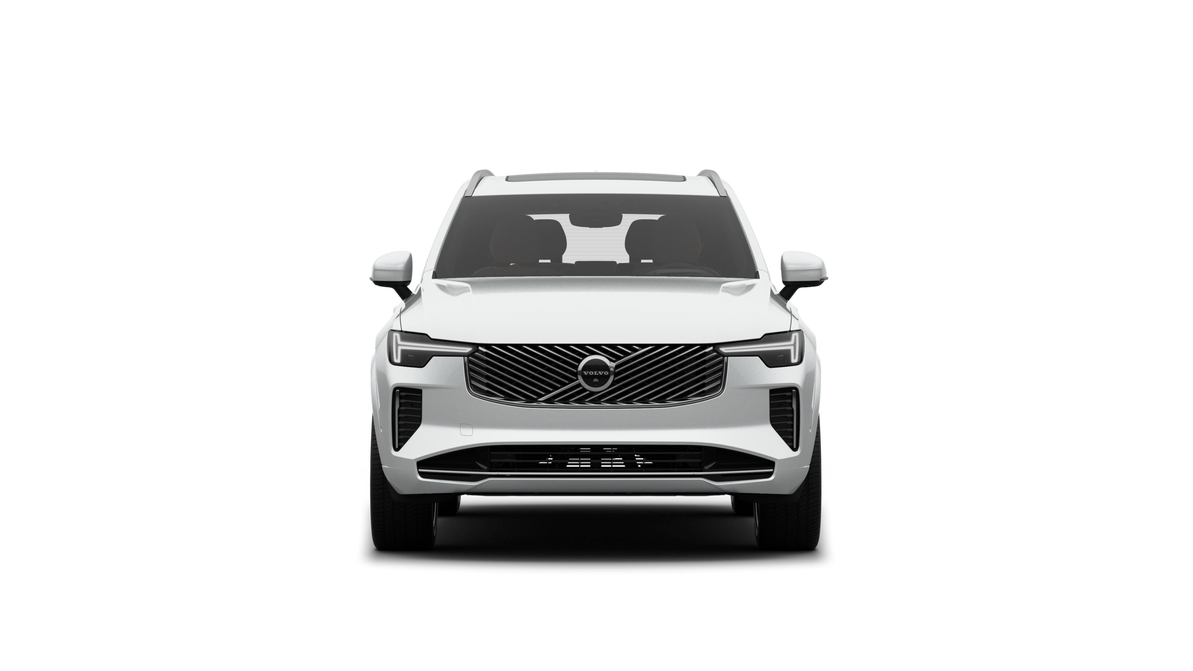 평범한 스튜디오 배경에 있는 볼보 자동차의 정면 모습.