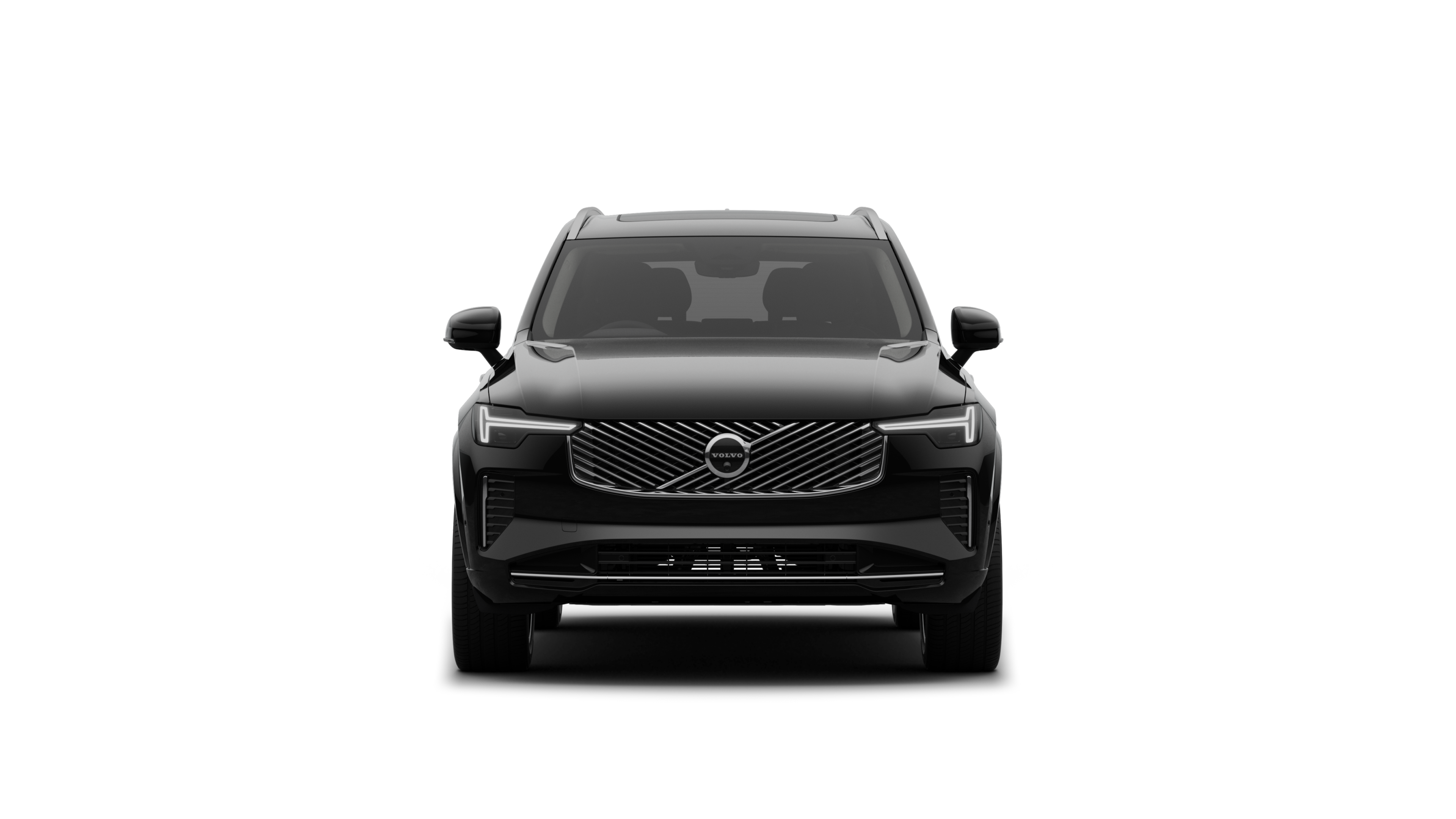 無地のスタジオを背景にしたボルボ車のフロントビュー。