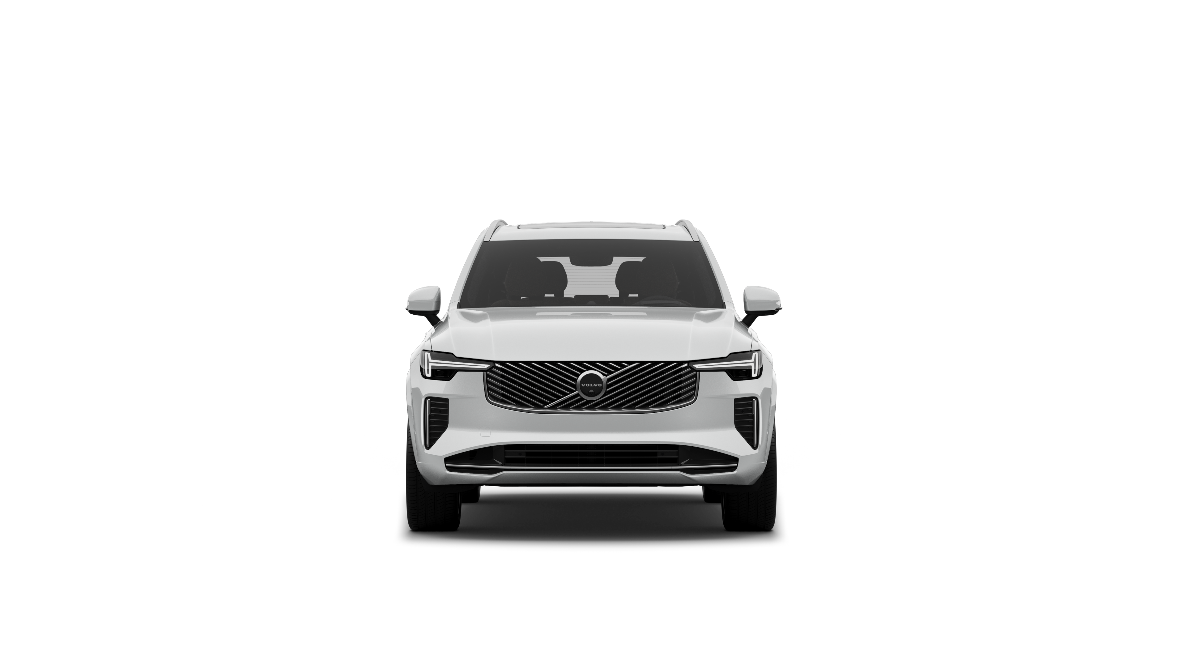 평범한 스튜디오 배경에 있는 볼보 자동차의 정면 모습.
