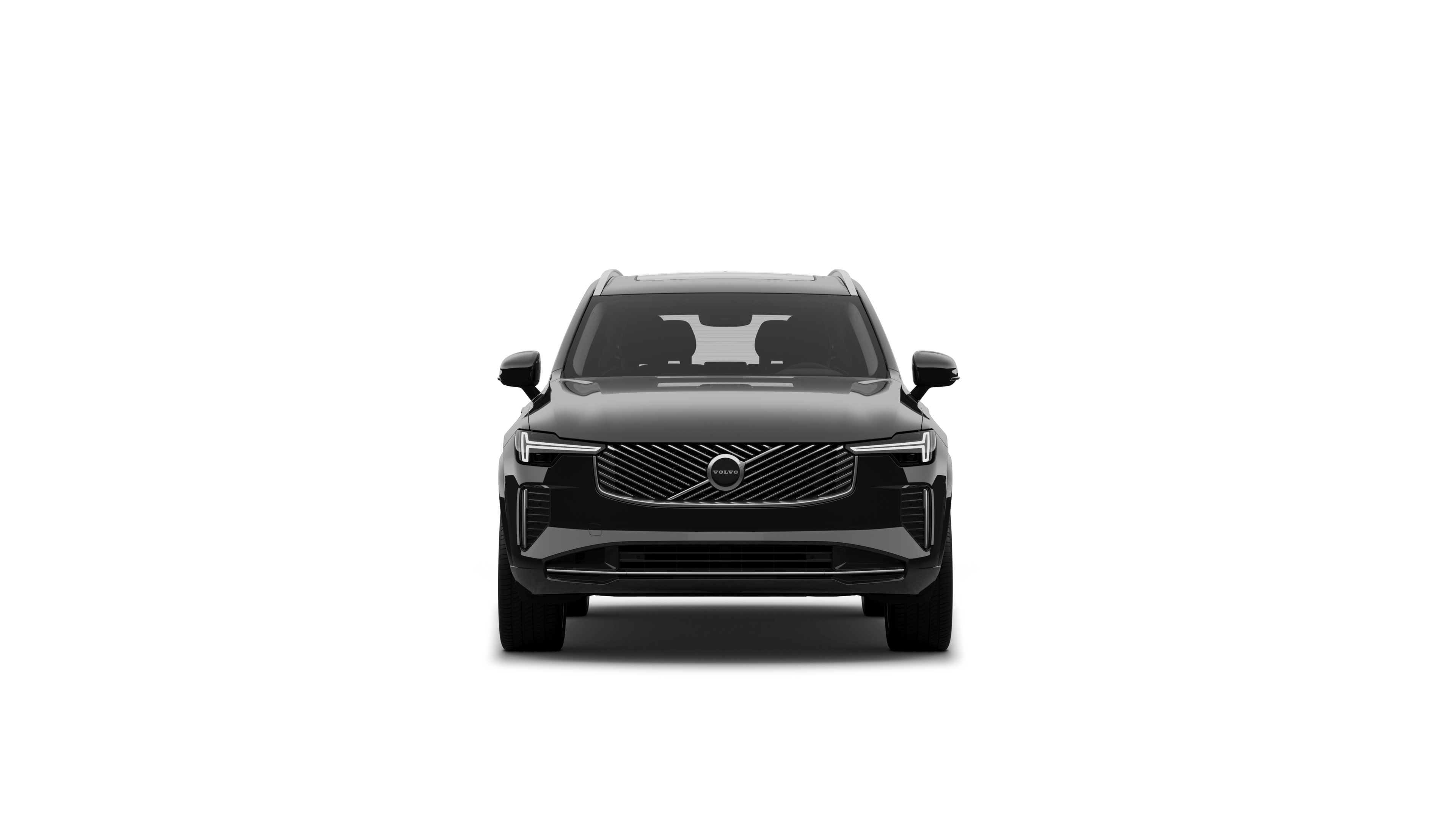 Vista frontal de un vehículo Volvo en un fondo de estudio liso.