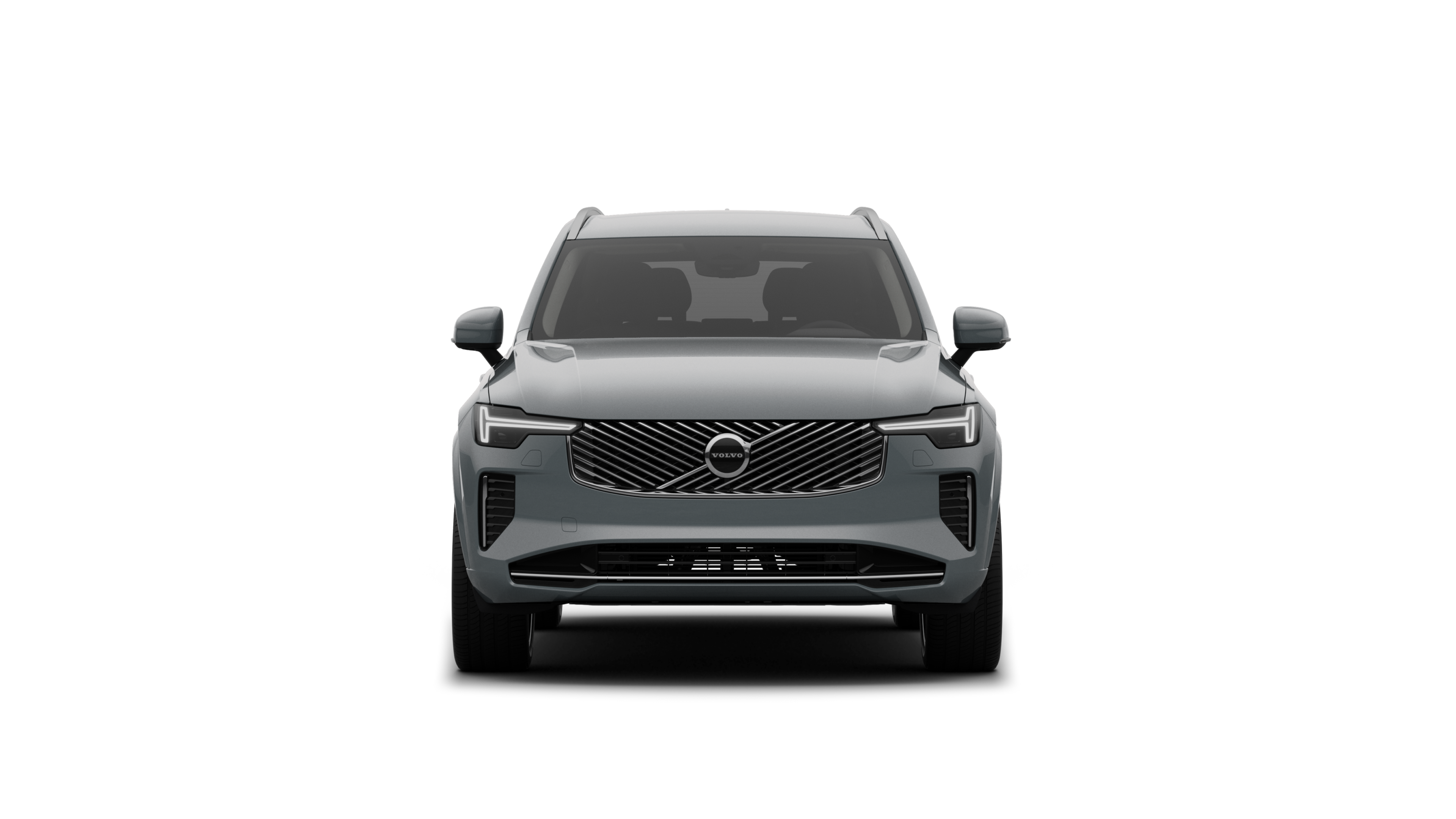 Sadə studiya fonunda Volvo avtomobilinin ön görünüşü.