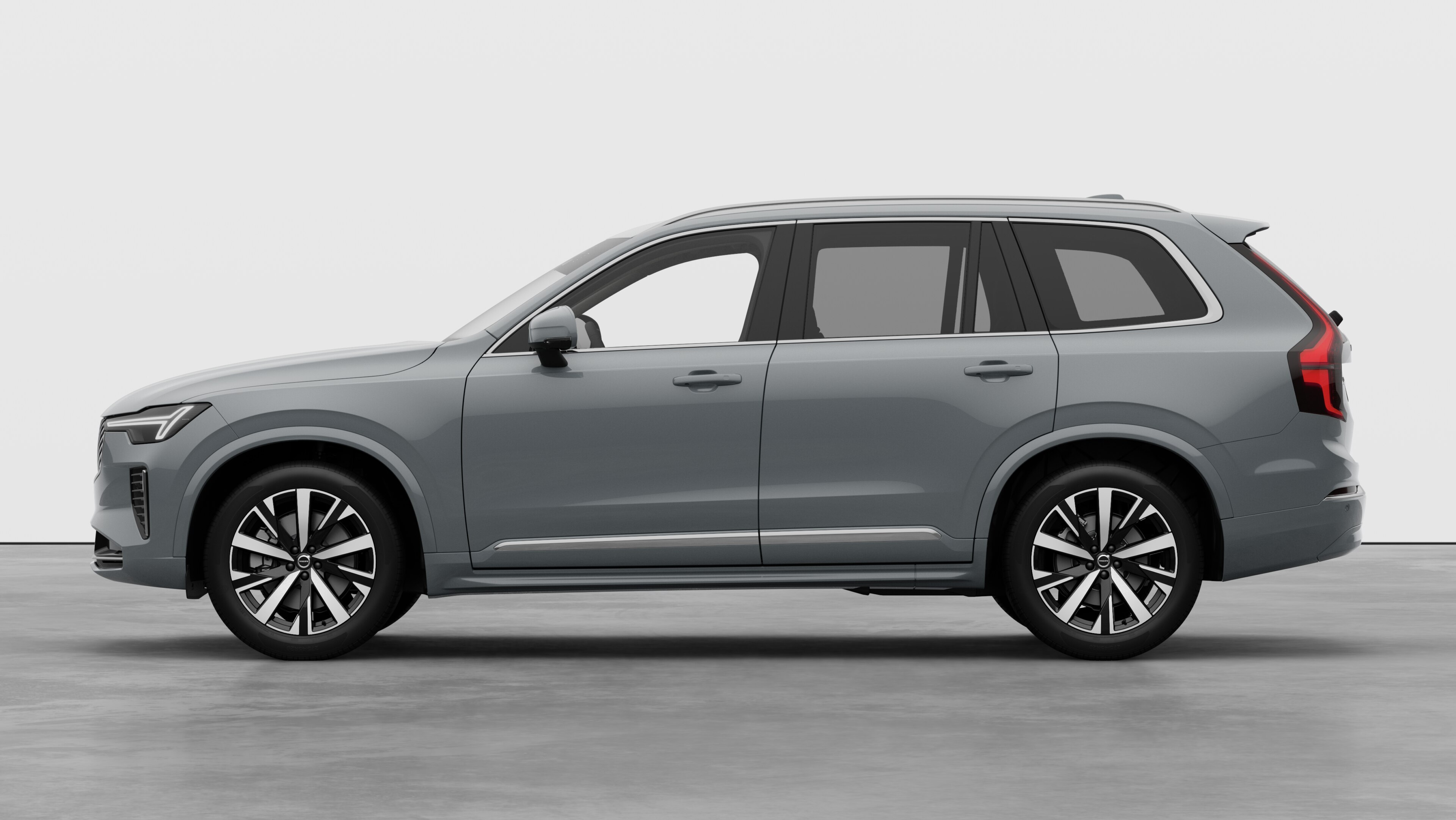 Volvo avtomobili sadə studiya fona qarşı yan baxışda. Əlavə detallar və identifikatorlar yoxdur.