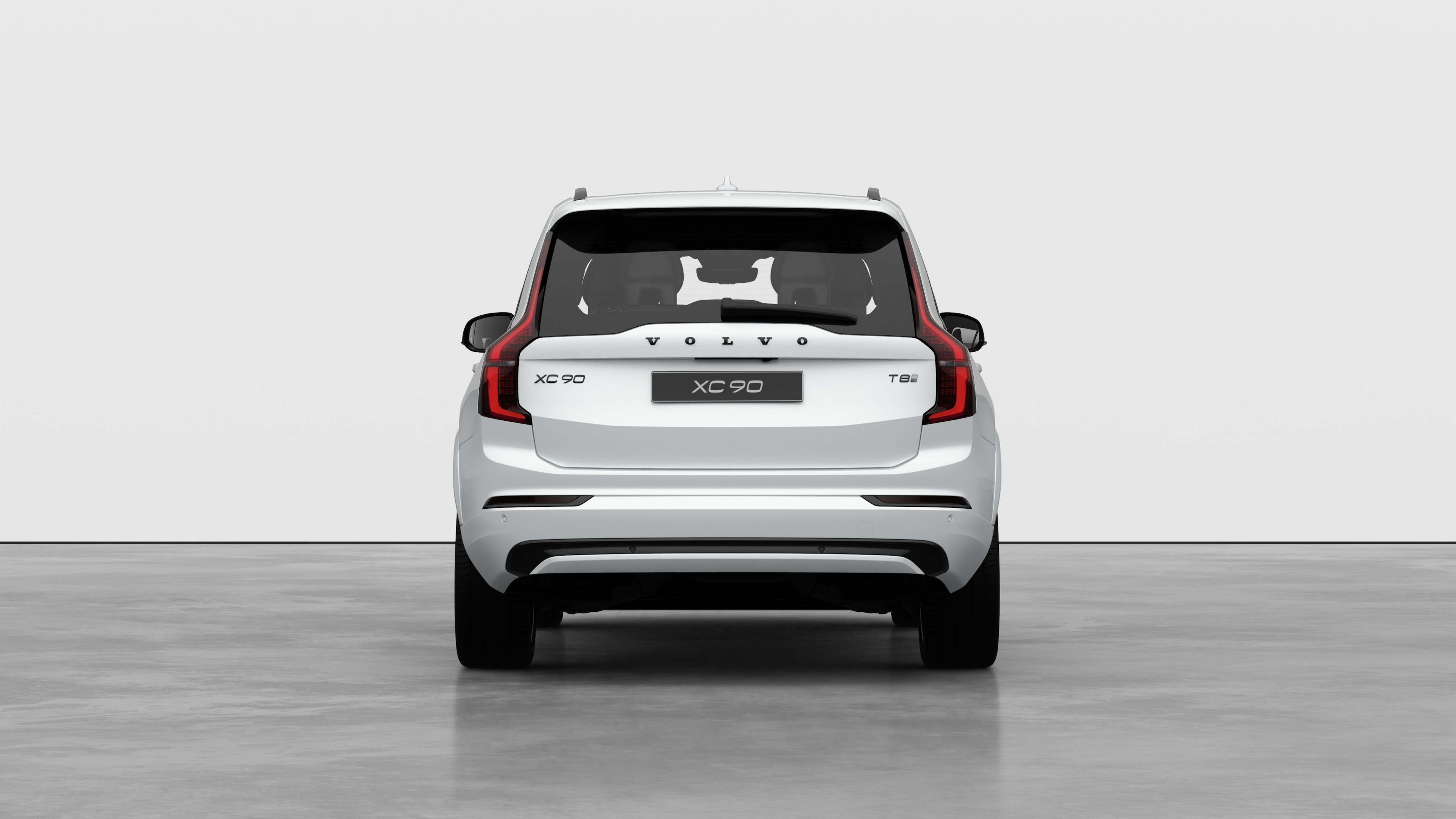 Widok samochodu Volvo z tyłu na tle zwykłego studia