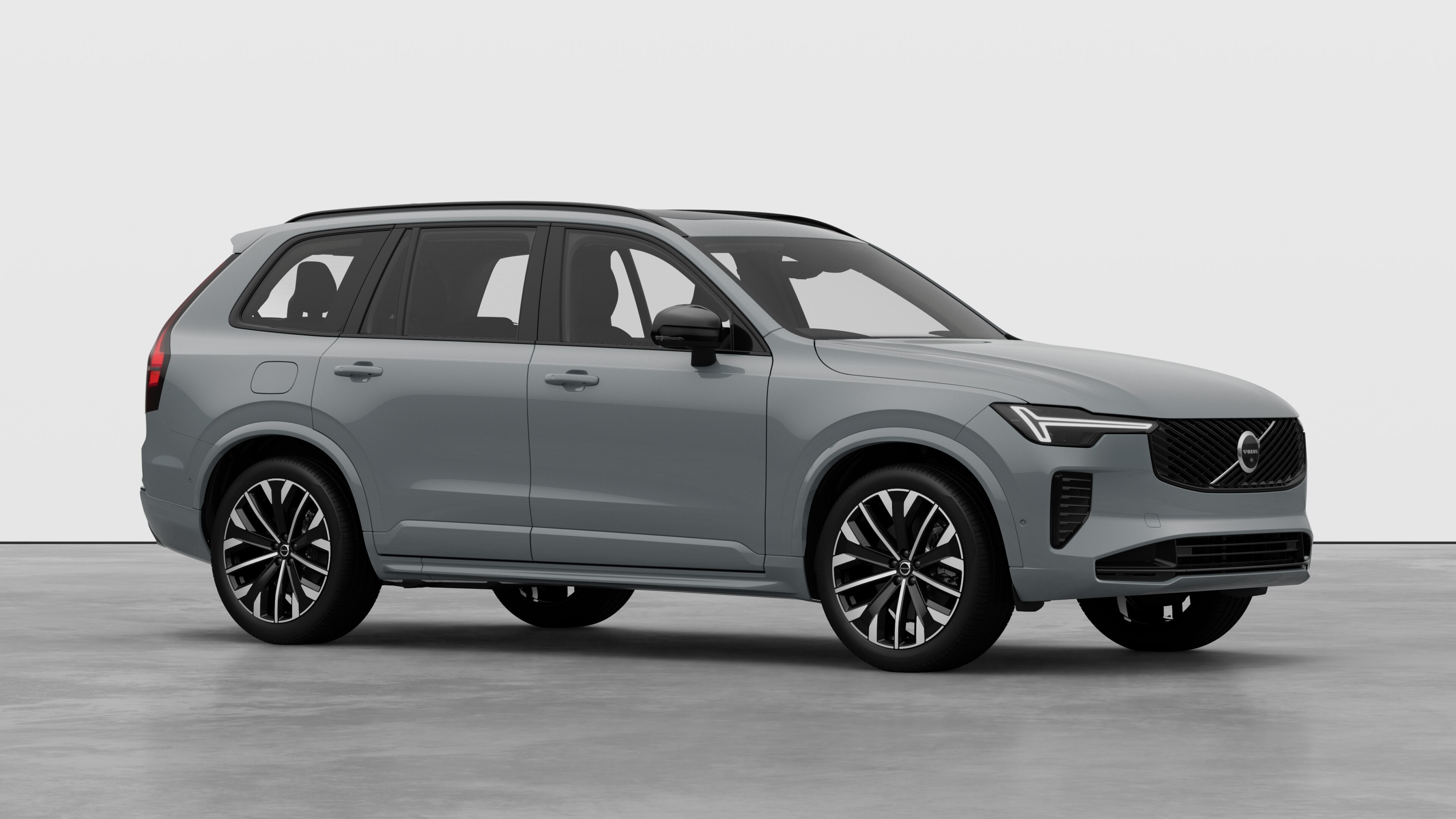 Volvo car exterior, three-quarter view in a plain studio background.