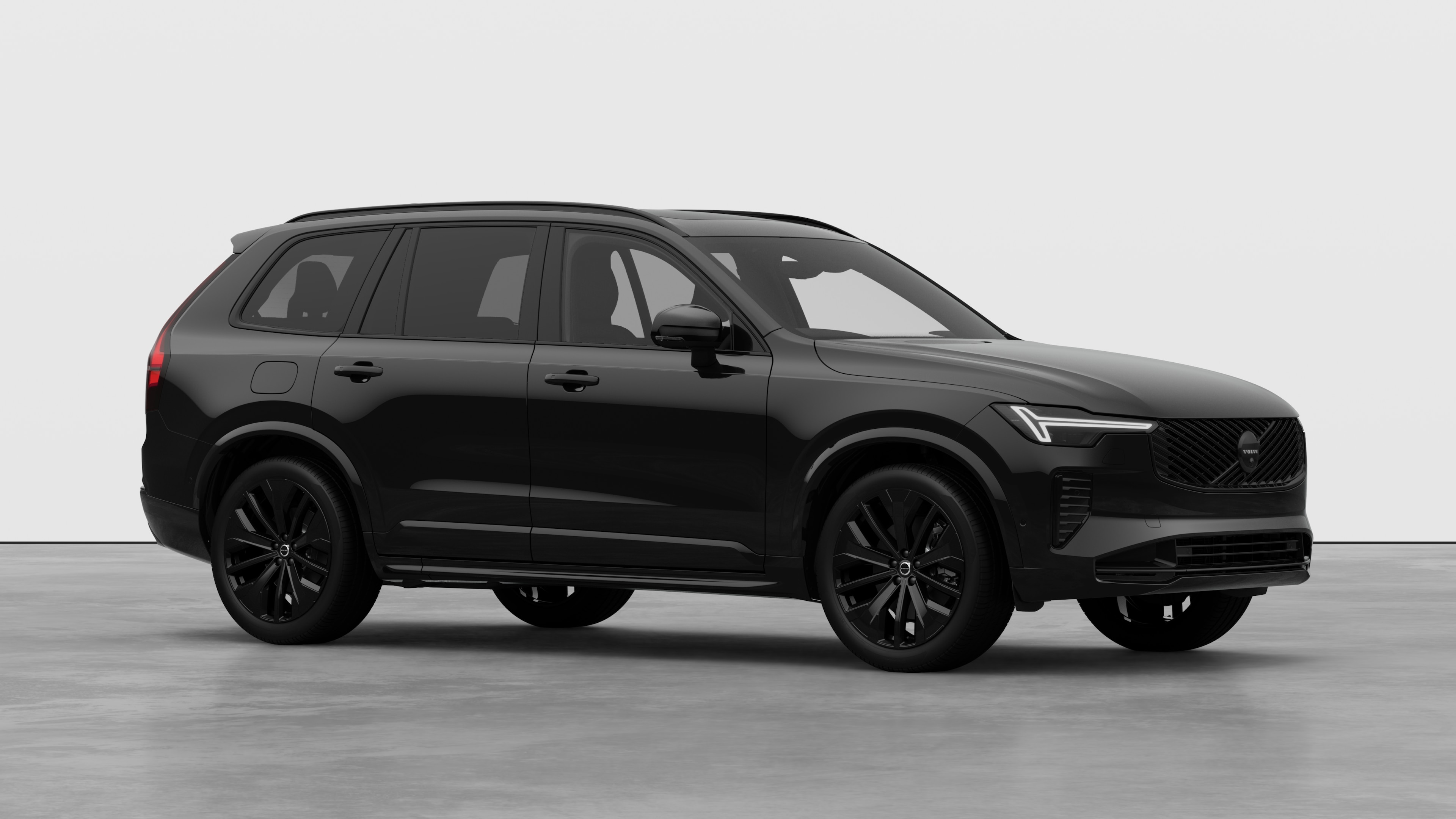 Volvo car exterior, three-quarter view in a plain studio background.
