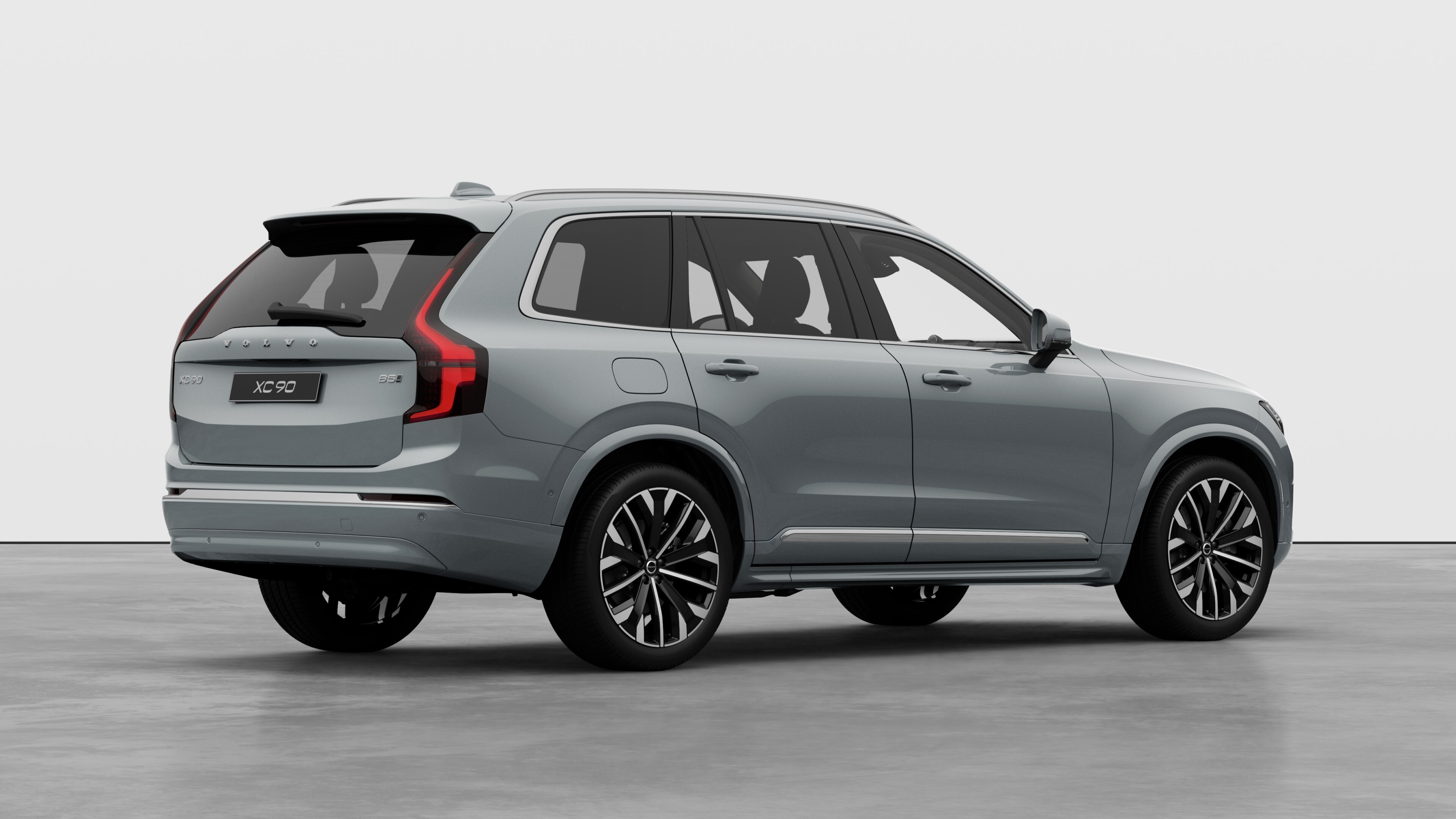 Volvo car rear three-quarter view on plain studio background.