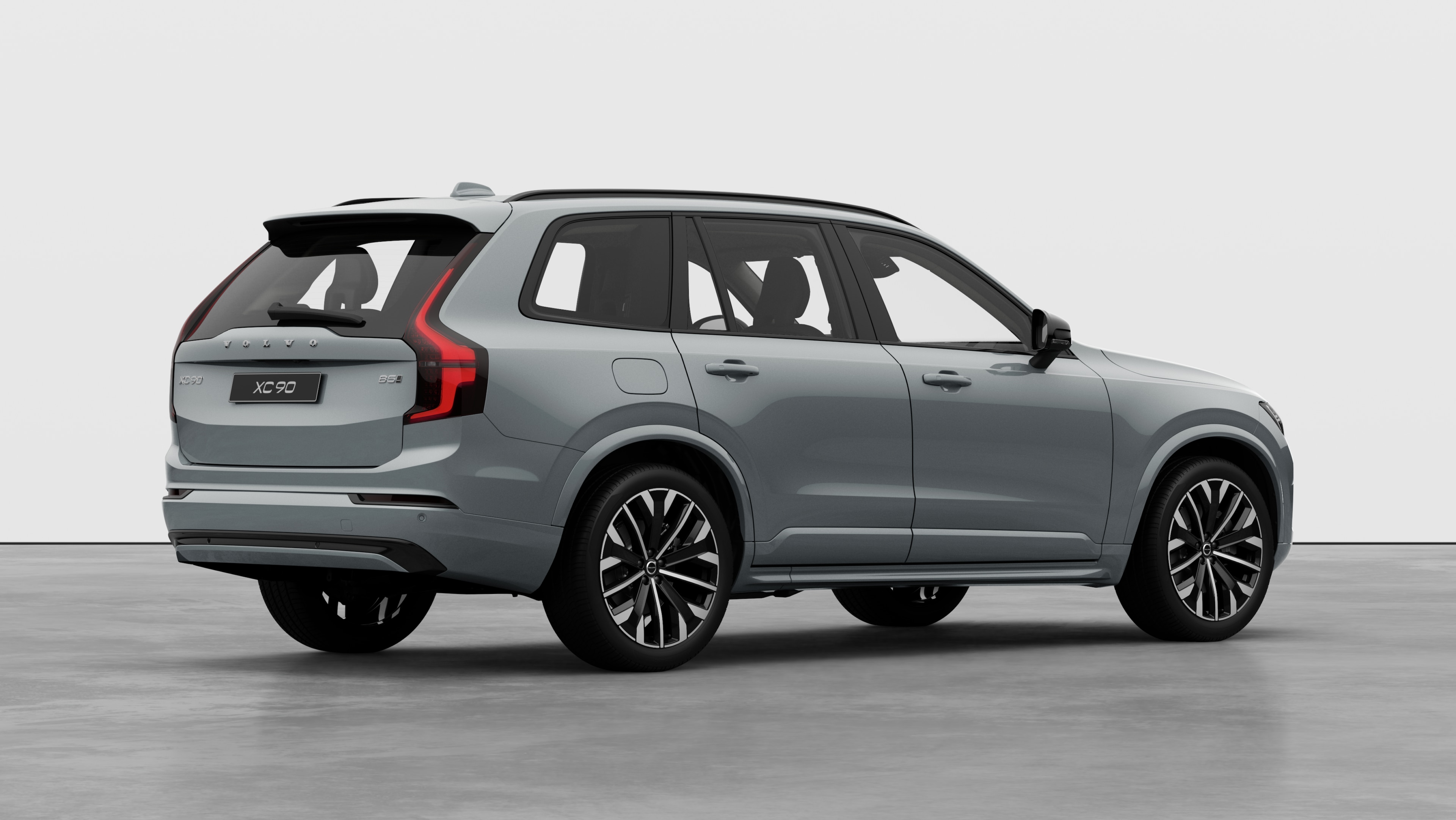 Widok z tyłu samochodu Volvo w trzech czwartych na zwykłym tle studia