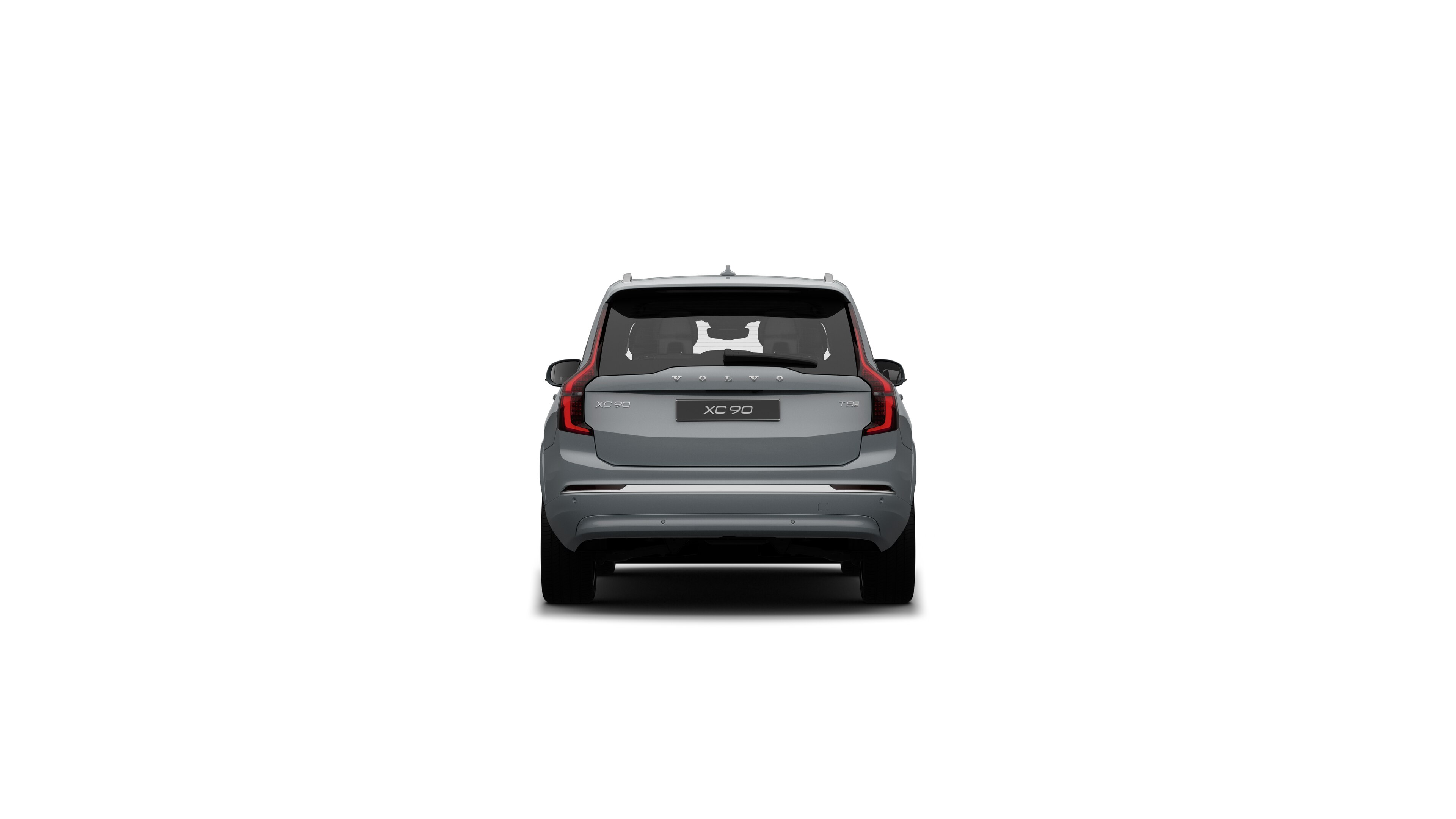 منظر خلفي لسيارة فولفو في خلفية استوديو عادية.