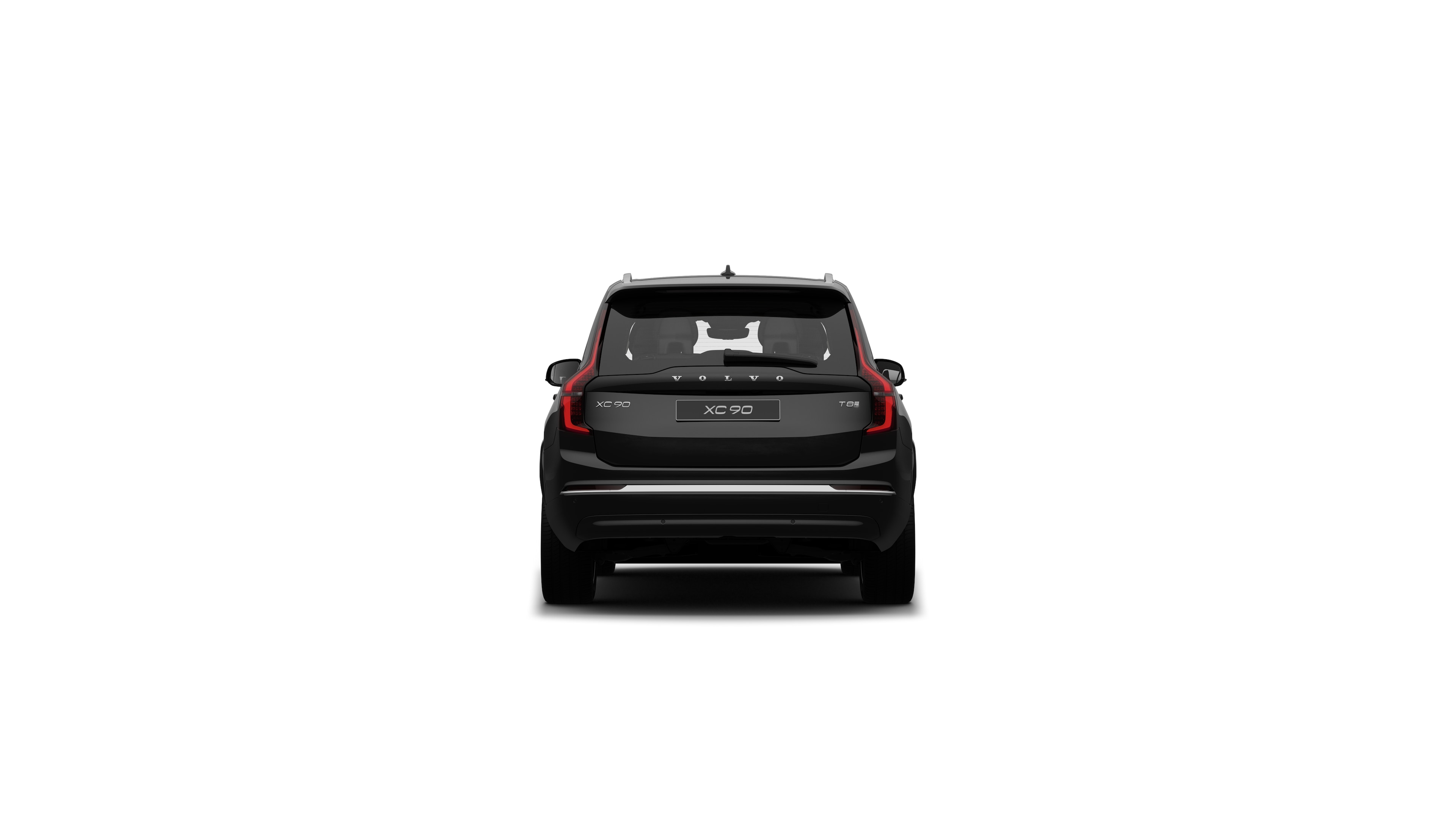 Vista trasera del vehículo Volvo en un fondo de estudio liso.