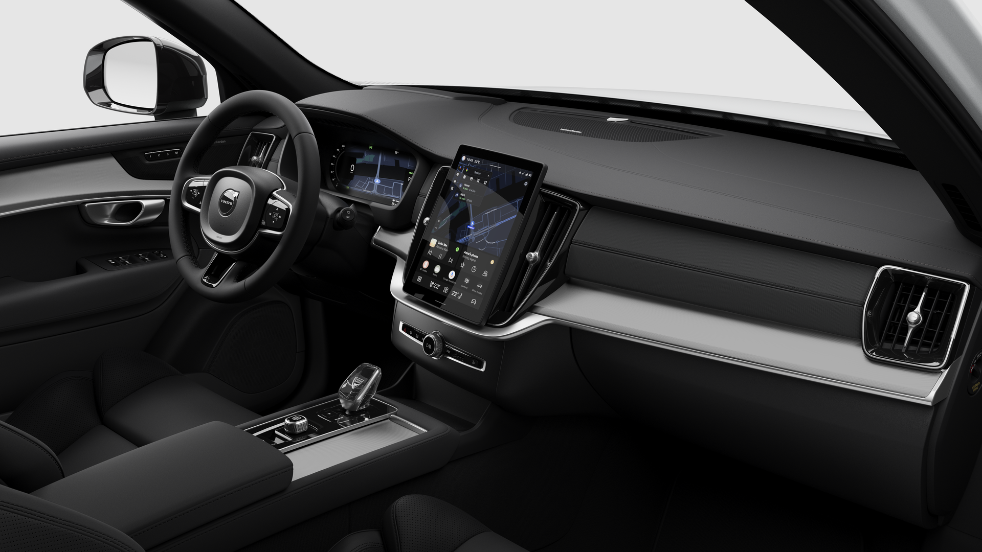 Wnętrze samochodu Volvo z deską rozdzielczą, kierownicą, konsolą środkową i cyfrowym wyświetlaczem na prostym tle studia