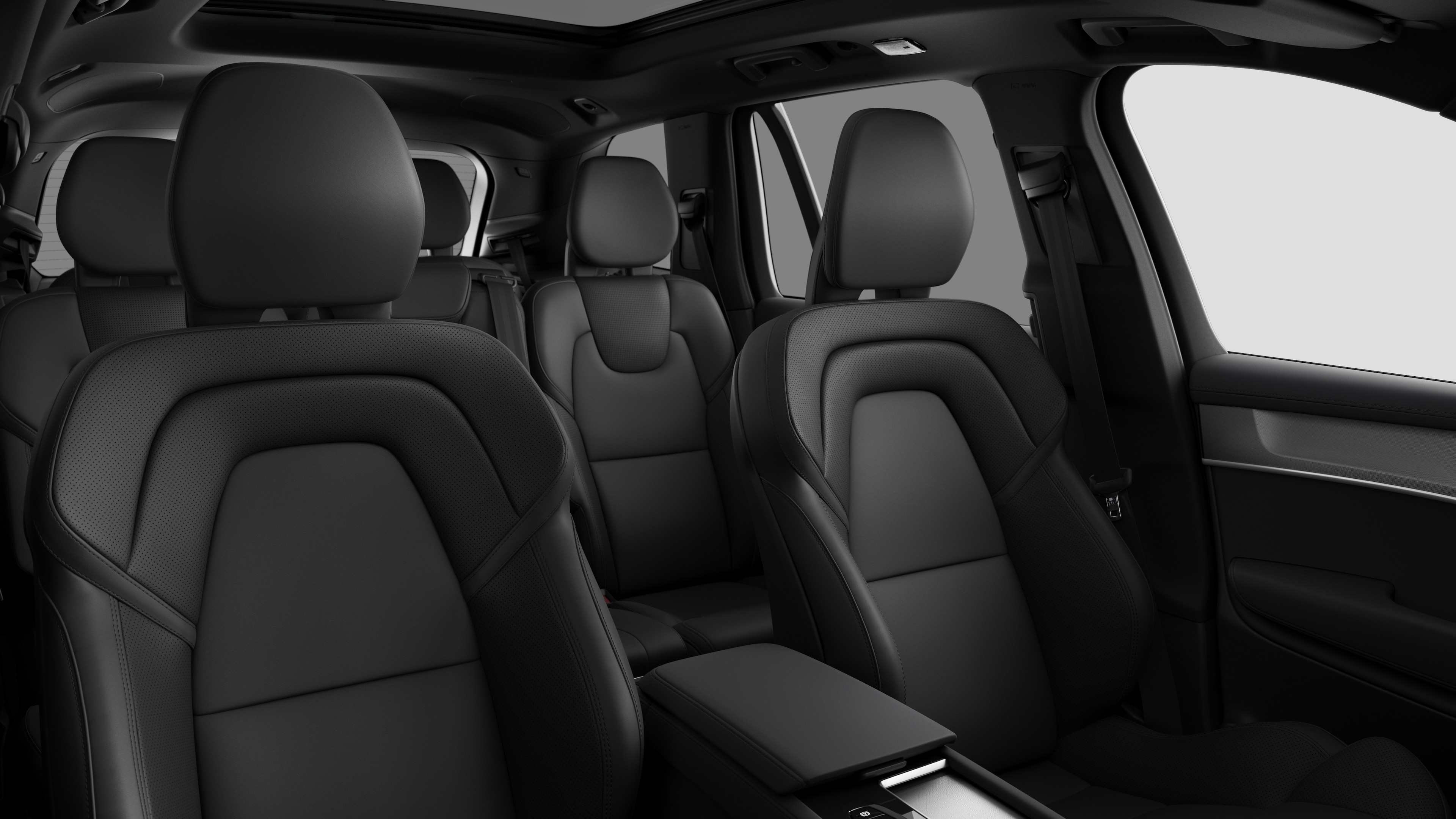 Volvo car interior showing rear passenger seats and center console in plain studio background.