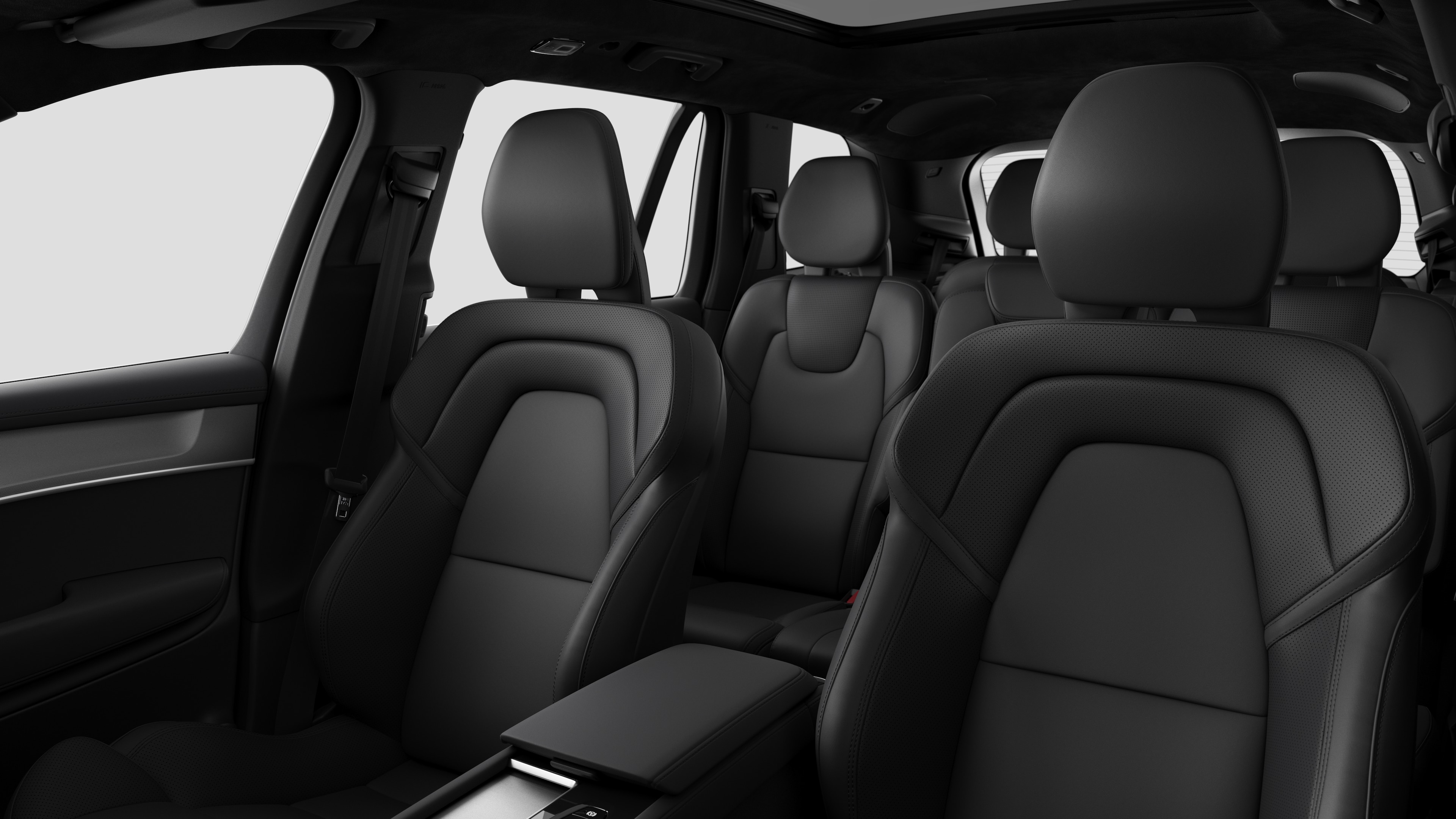 Innenraum eines Volvo mit den hinteren Beifahrersitzen und der Mittelkonsole im schlichten Studiohintergrund.