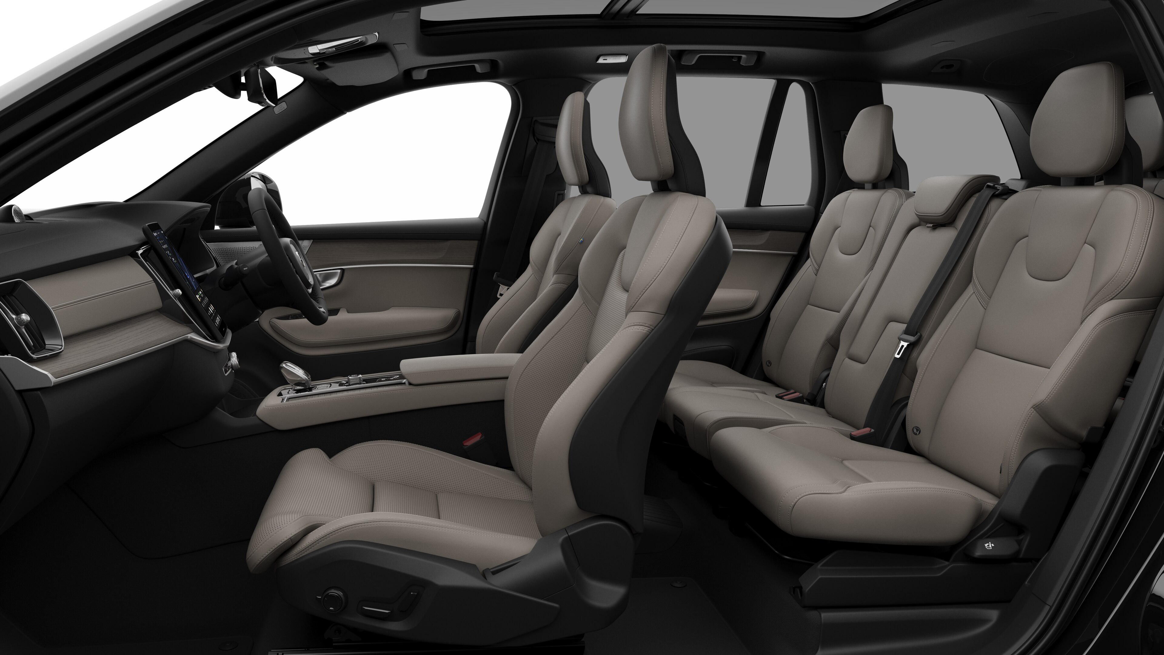 Volvo car interior side view showcasing front seats, rear passenger seats, steering wheel, dashboard, and center console, set against plain studio background.
