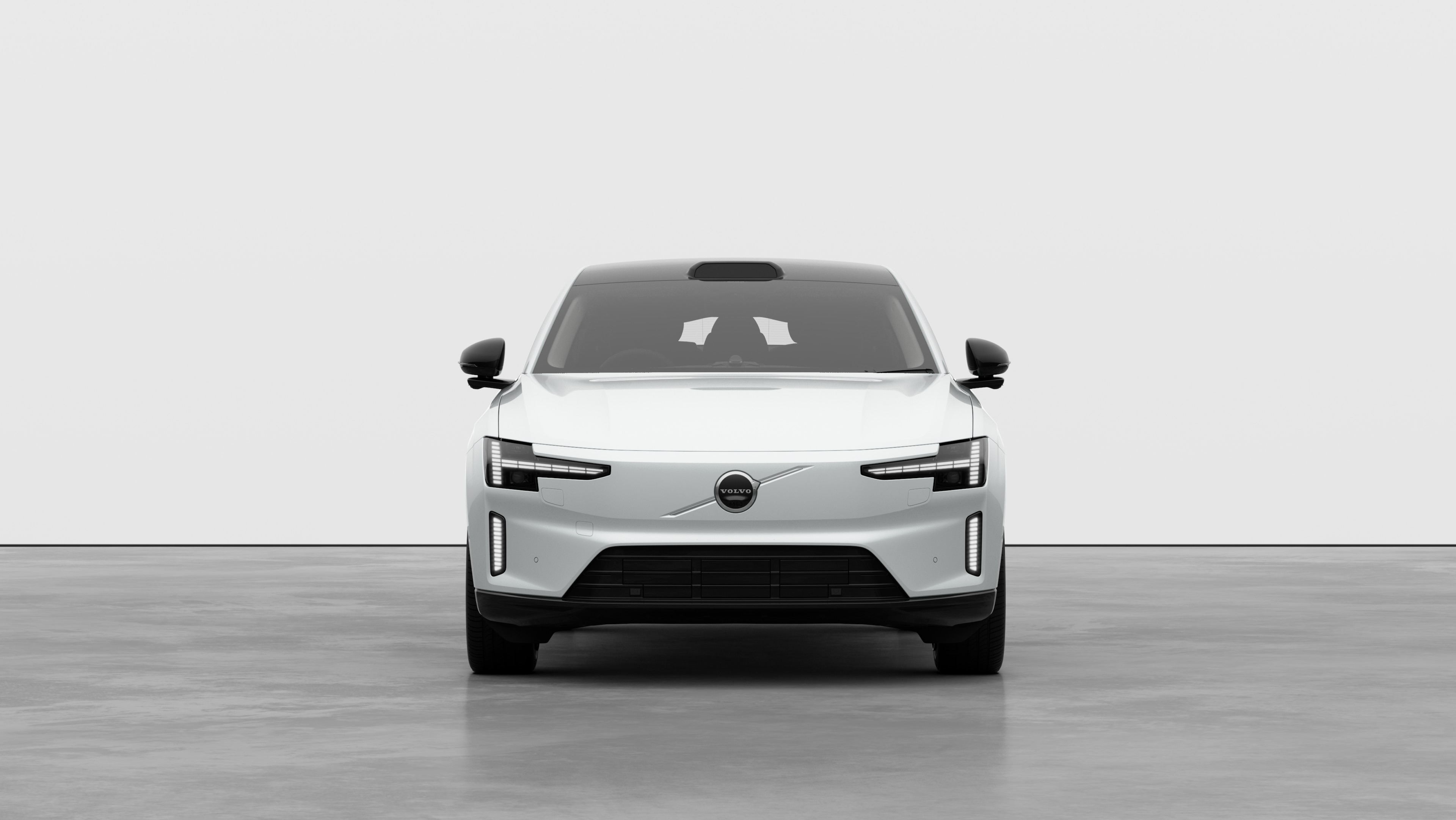 Front view of a Volvo car in a plain studio background.