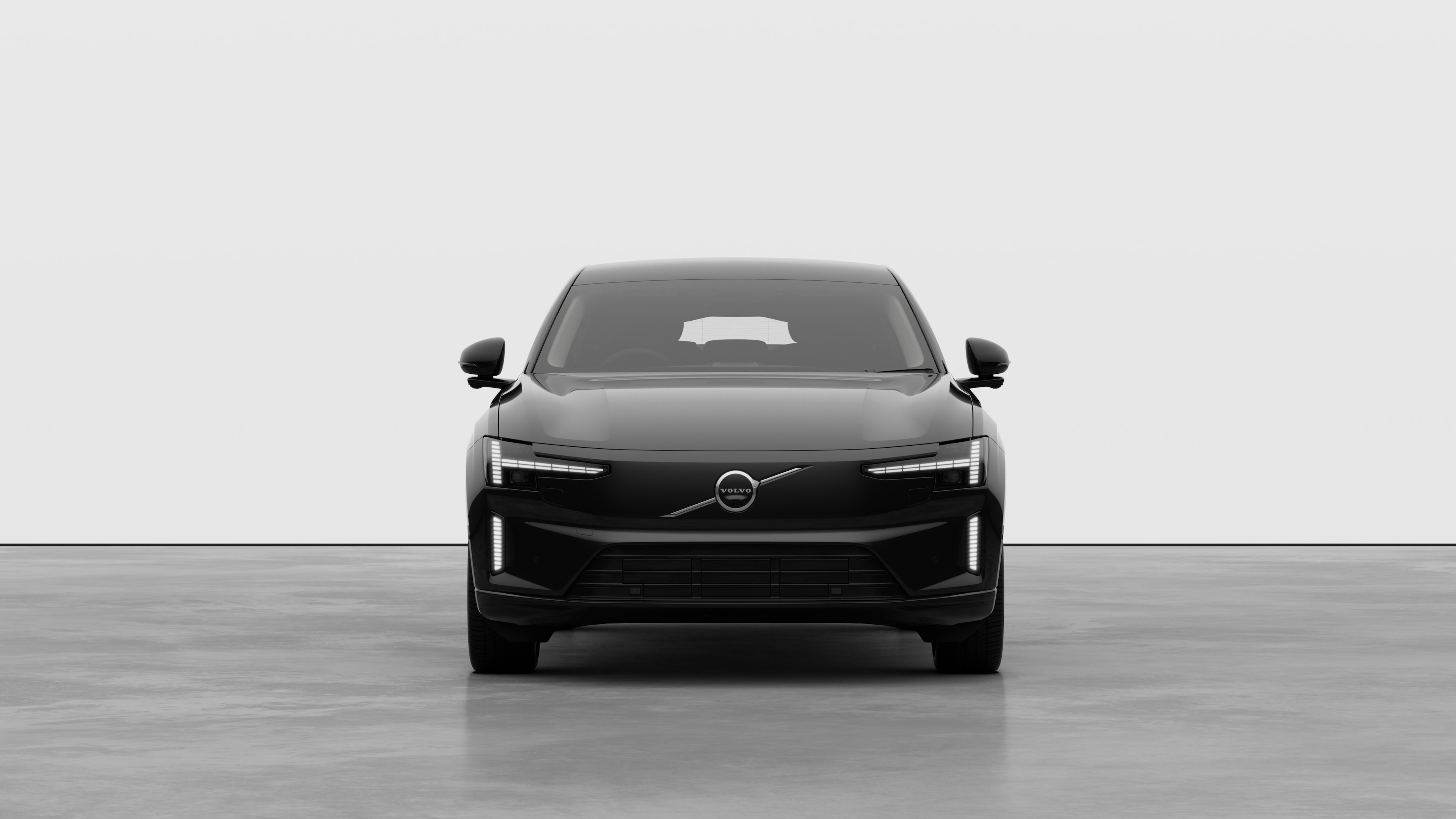 Front view of a Volvo car in a plain studio background.