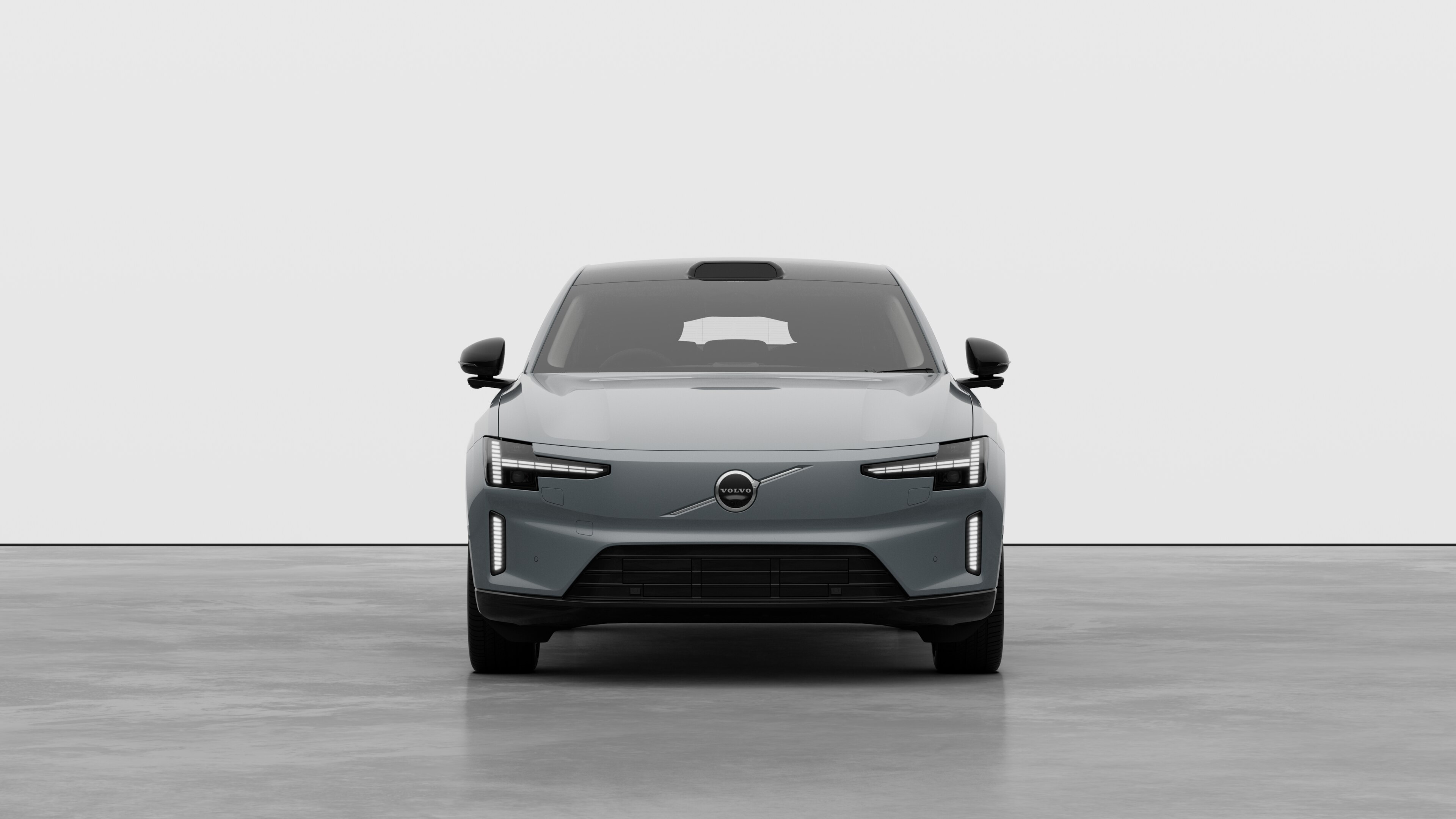 Front view of a Volvo car in a plain studio background.