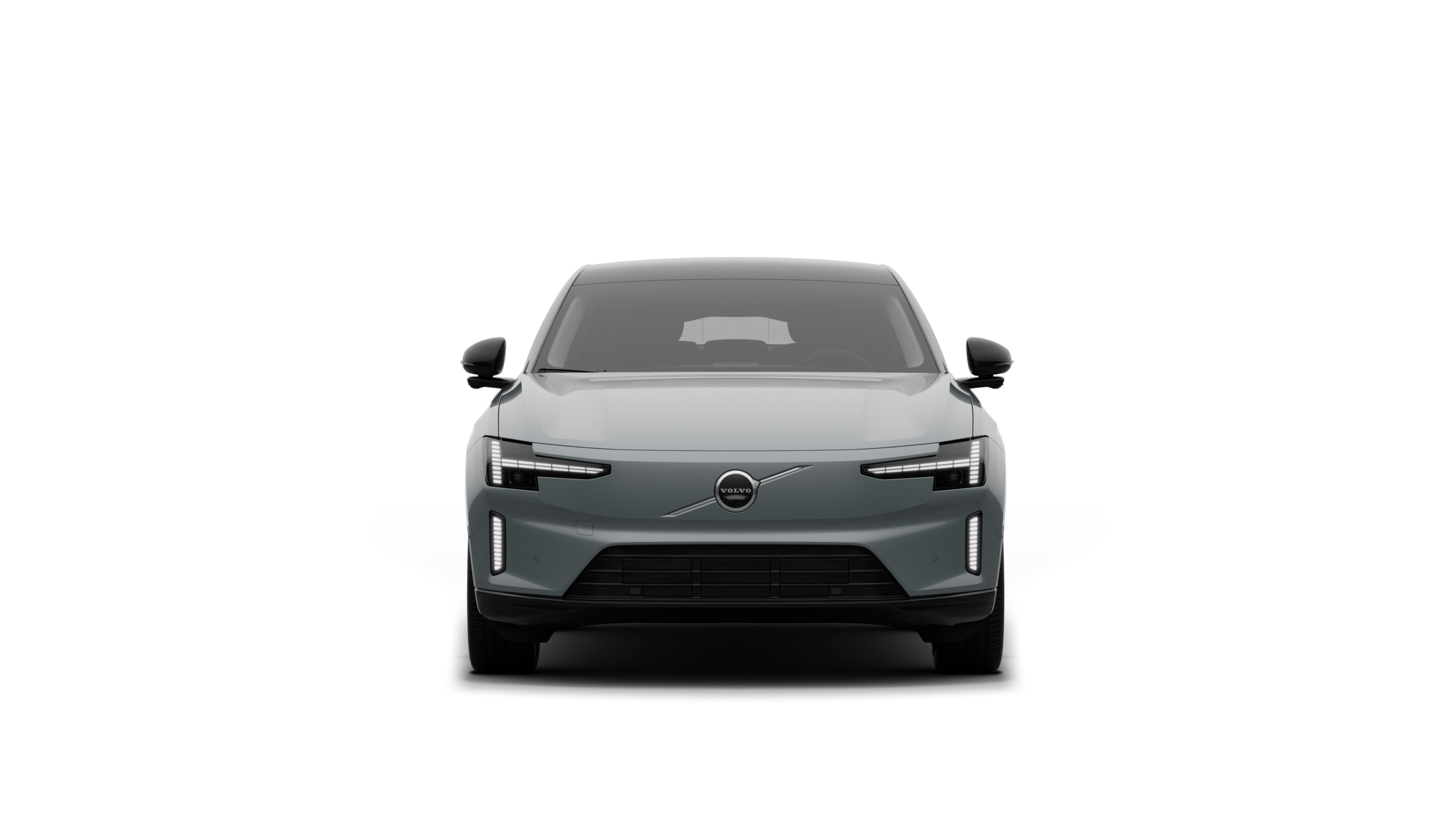 Vista frontale di un'auto Volvo sullo sfondo di un semplice studio.