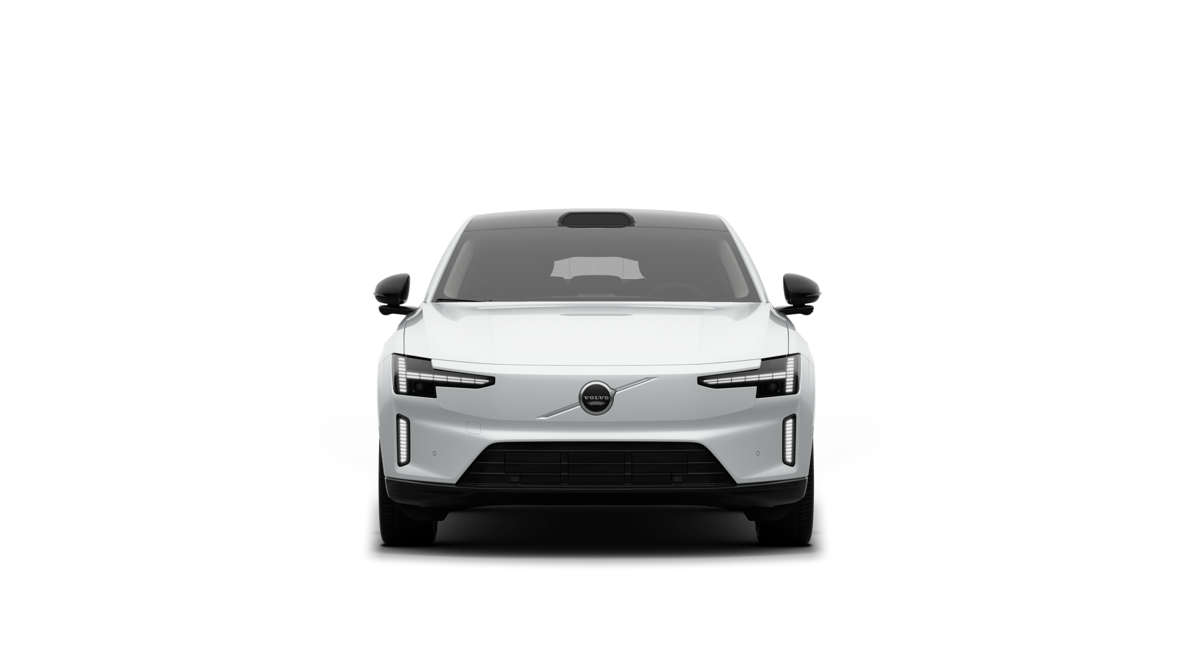 Vista frontale di un'auto Volvo sullo sfondo di un semplice studio.