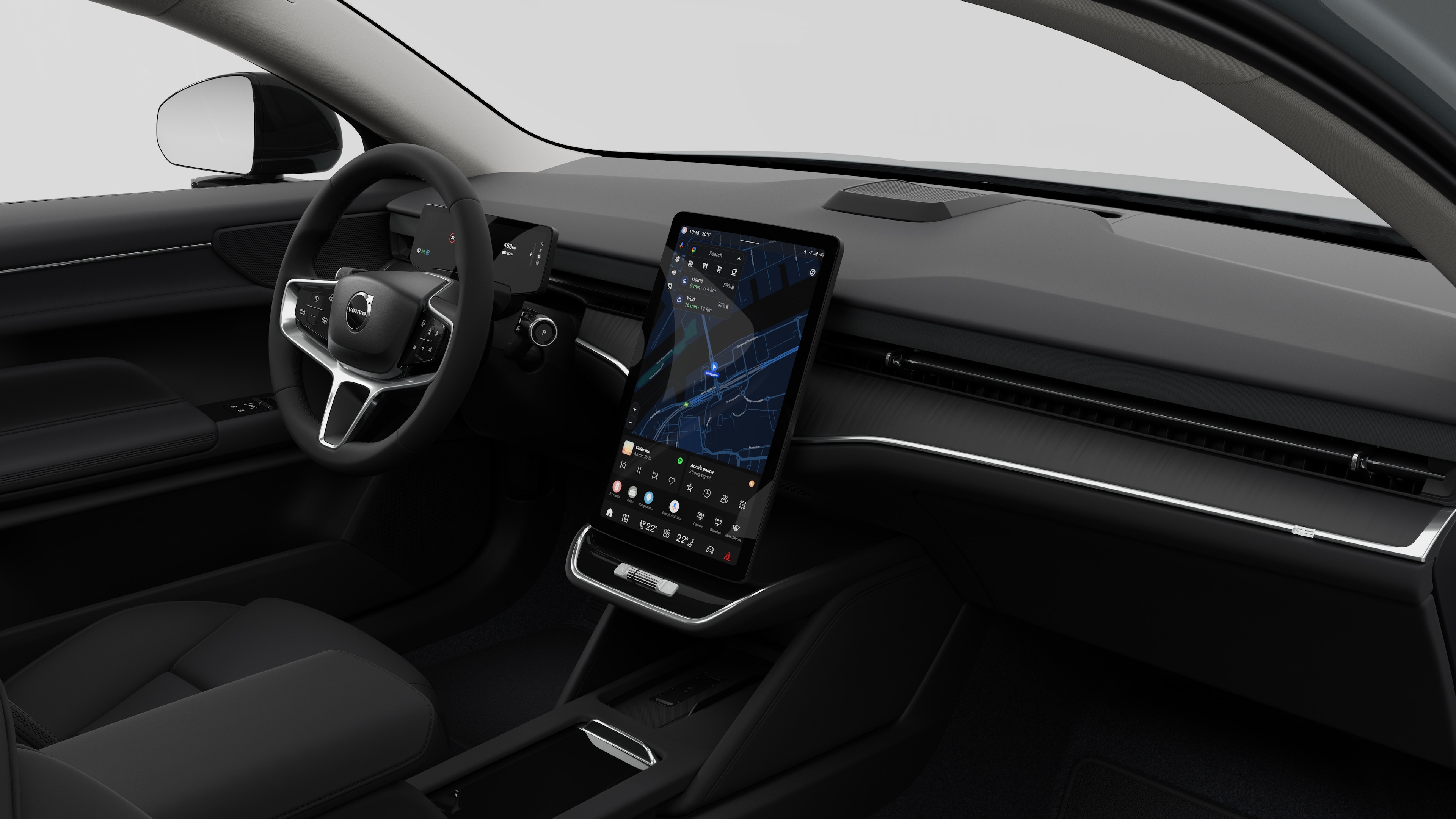 Innenansicht eines Volvo mit Armaturenbrett, Lenkrad, Mittelkonsole und digitalem Bildschirm in einem schlichten Studiohintergrund.