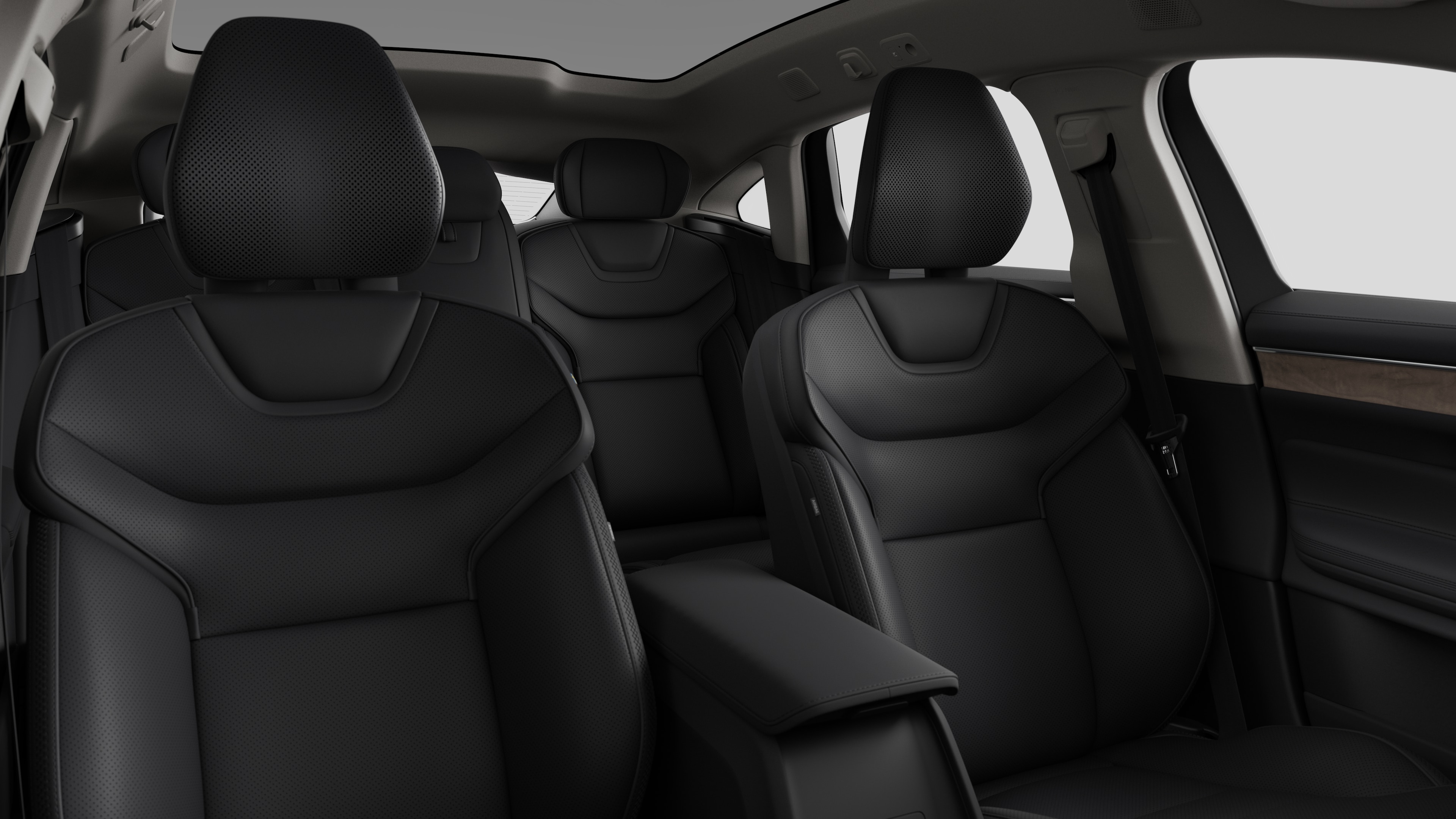 Volvo car interior showing rear passenger seats and center console in plain studio background.