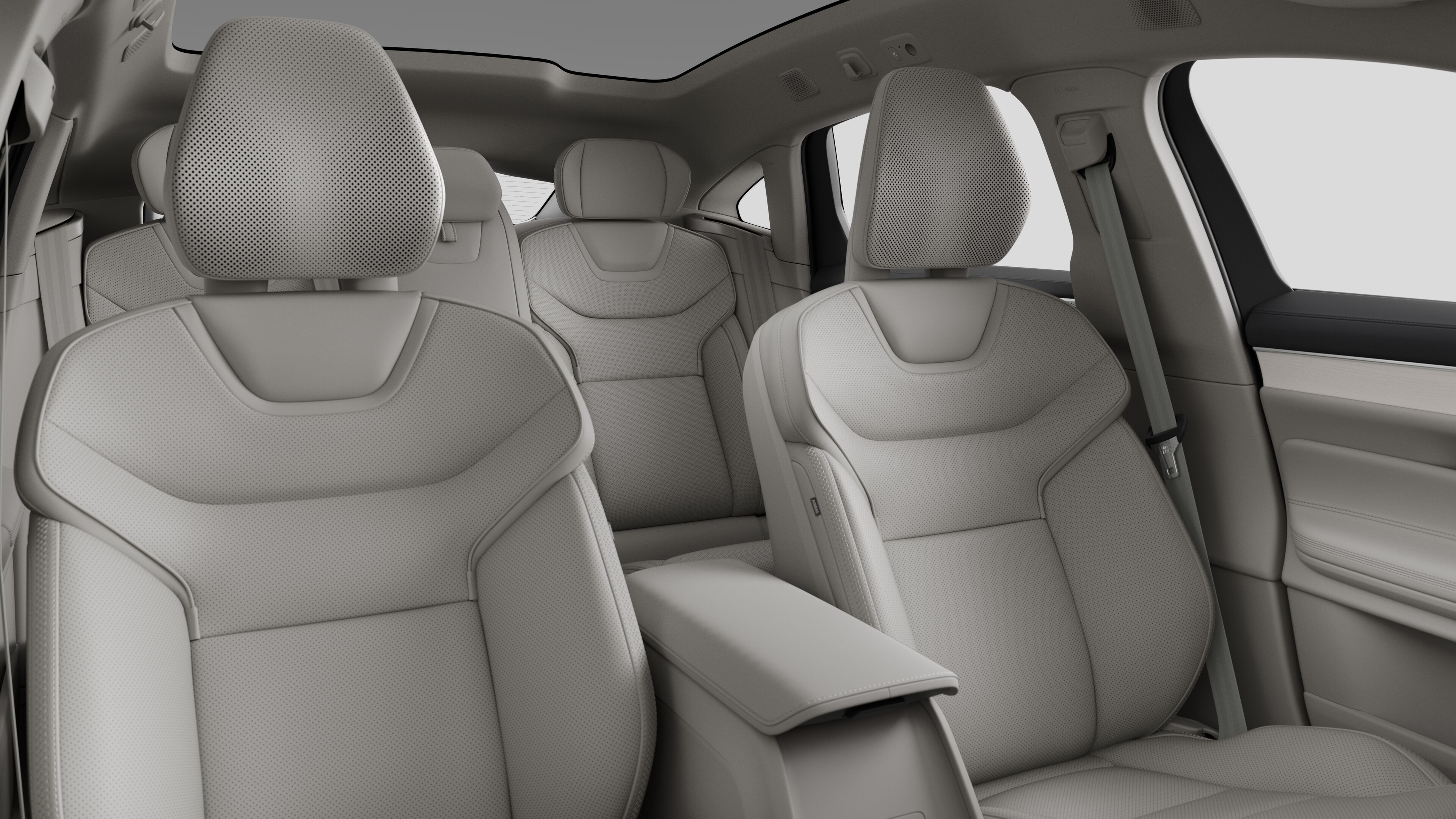 Volvo car interior showing rear passenger seats and center console in plain studio background.