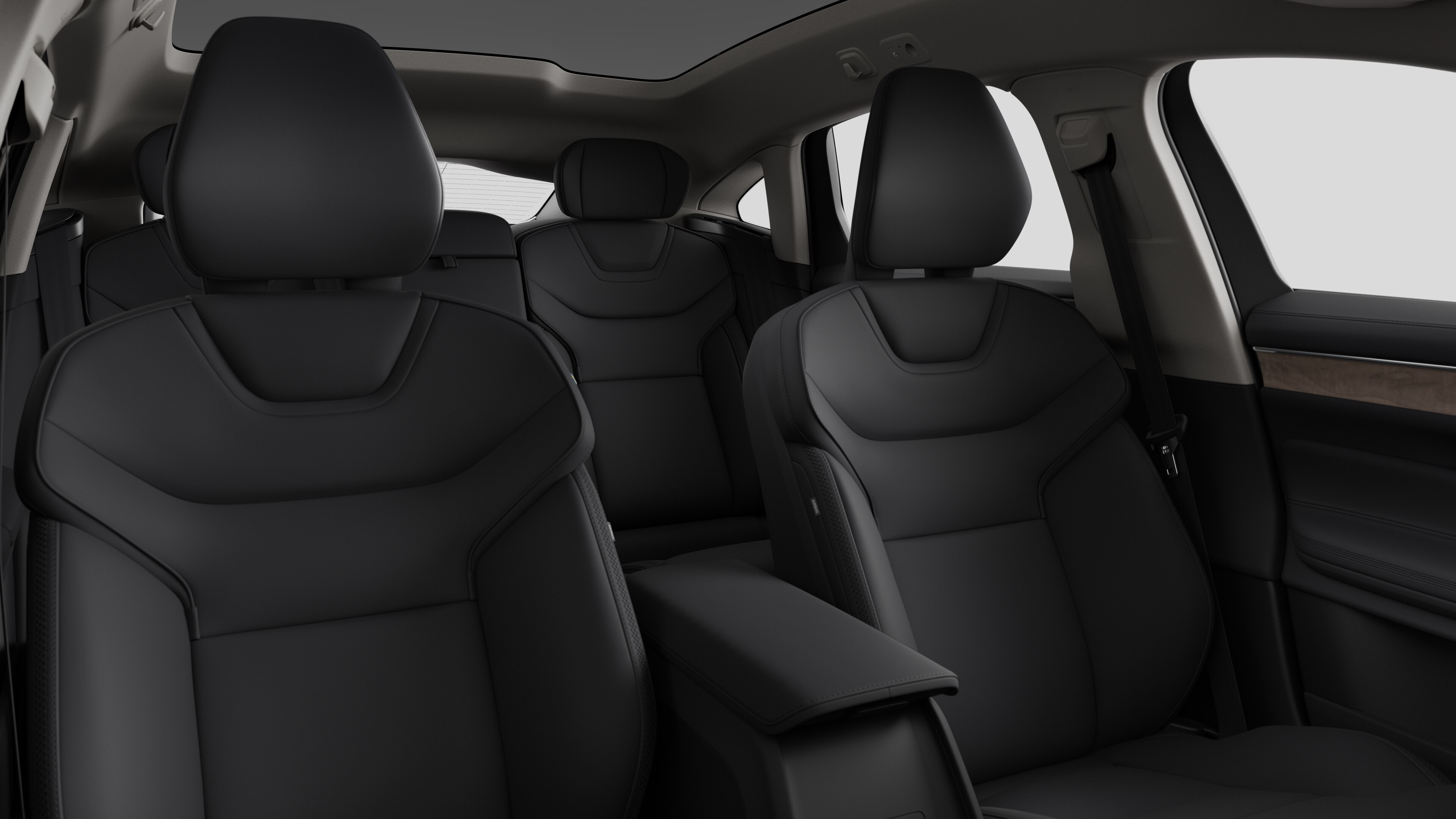 Volvo car interior showing rear passenger seats and centre console in plain studio background.