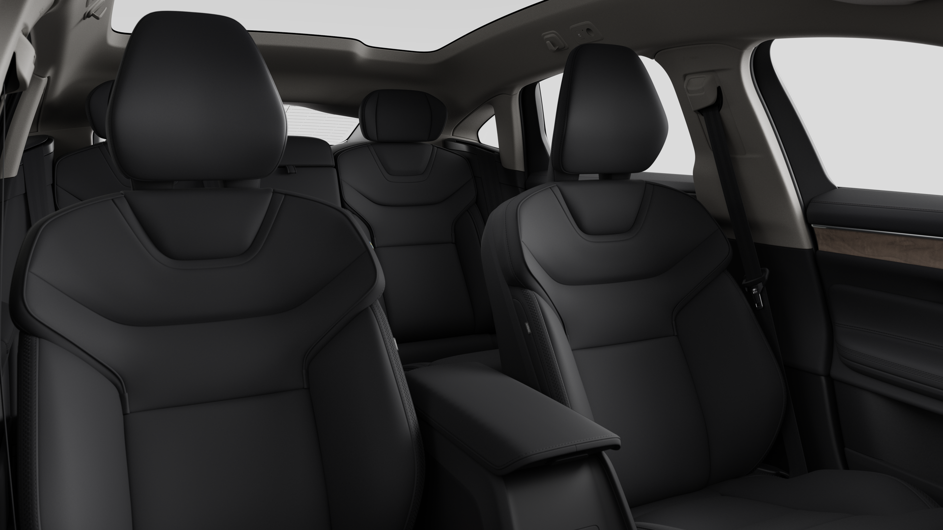 Volvo car interior showing rear passenger seats and center console in plain studio background.
